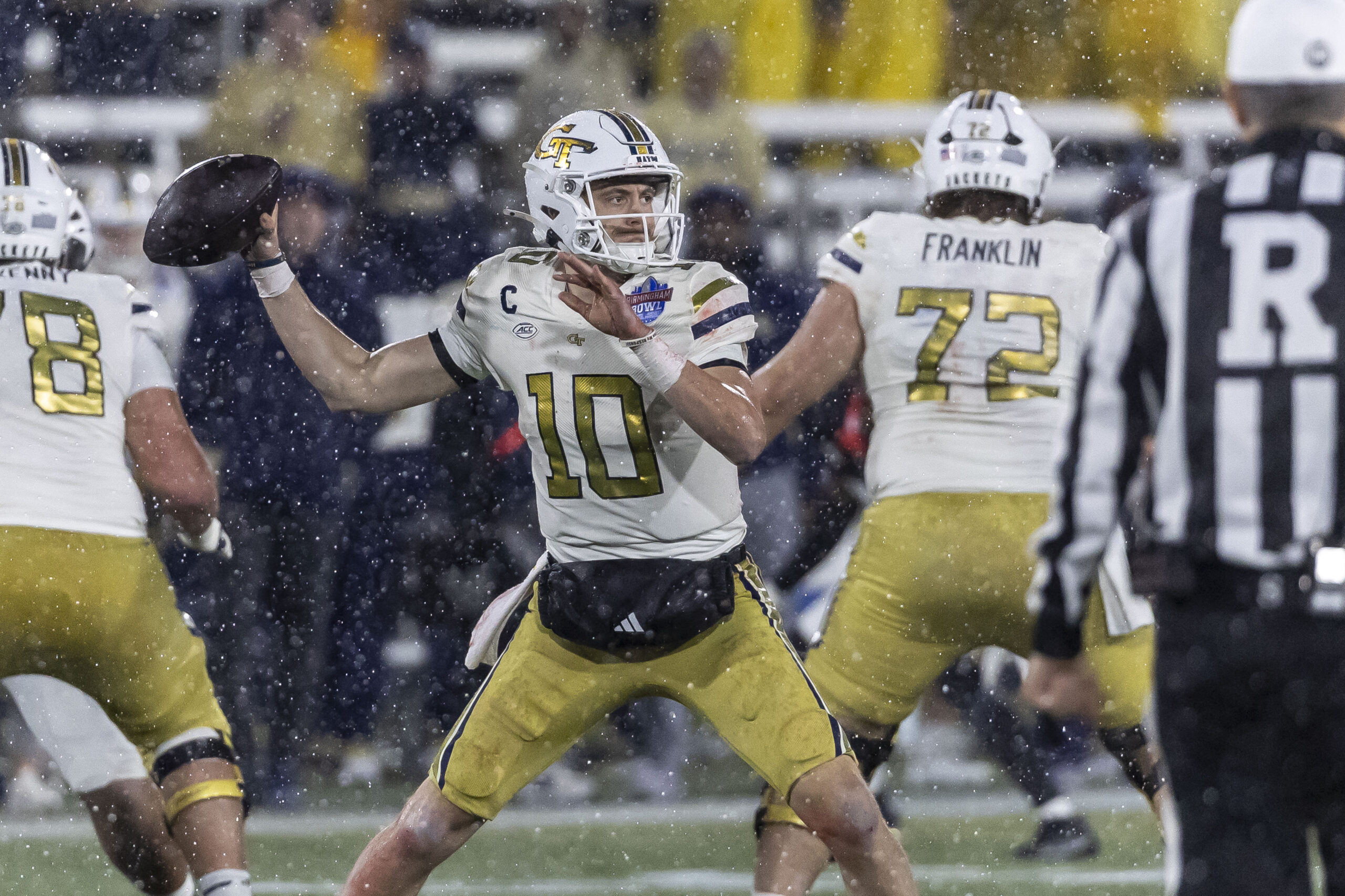 Dec 27, 2024; Birmingham, AL, USA; Georgia Tech Yellow Jackets quarterback Haynes King (10) looks to throw against the Vanderbilt Commodores during the second half of the 2024 Birmingham Bowl at Protective Stadium. Mandatory Credit: Vasha Hunt-Imagn Images