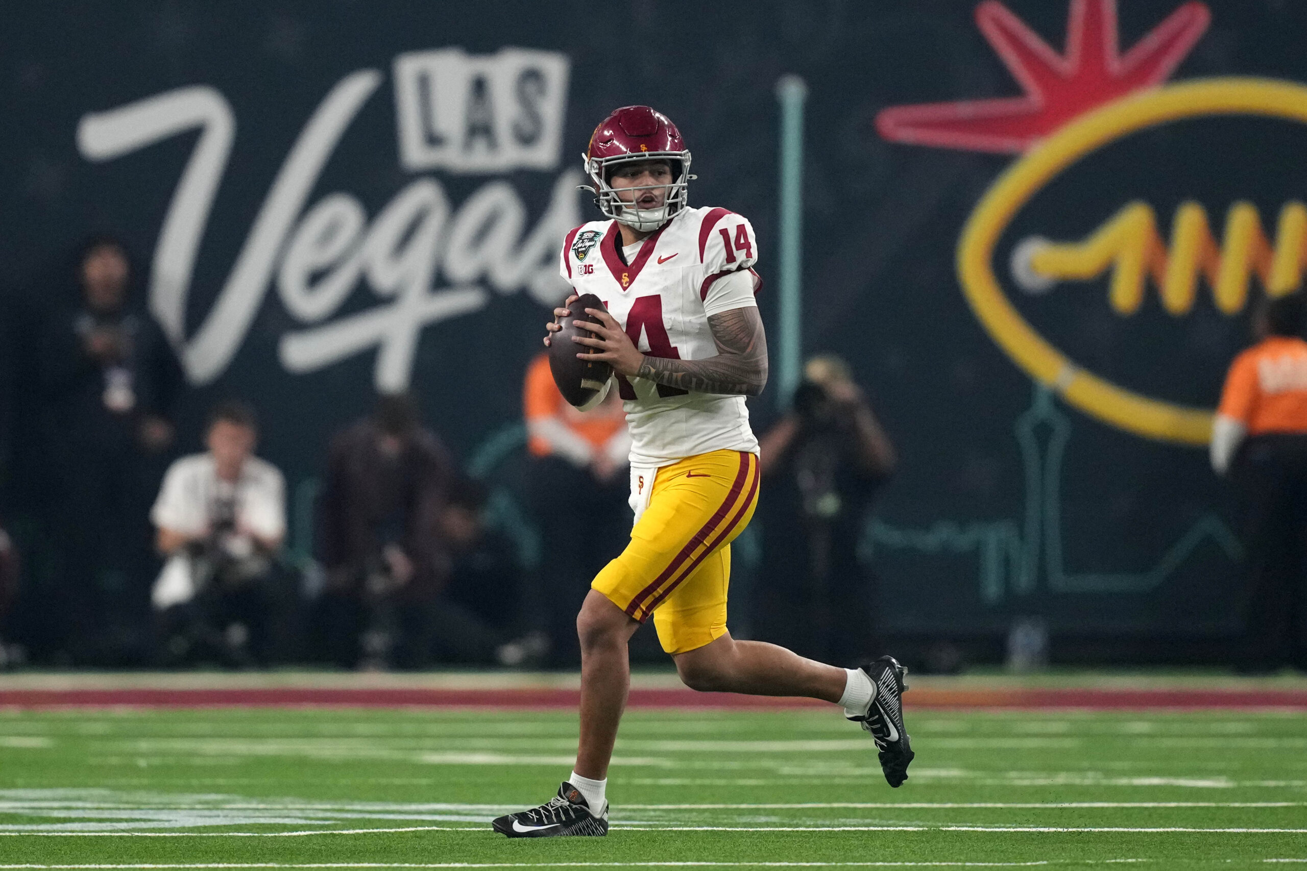 Dec 27, 2024; Las Vegas, NV, USA; Southern California Trojans quarterback Jayden Maiava (14) throws the ball against the Texas A&M Aggies in the first half at Allegiant Stadium. Mandatory Credit: Kirby Lee-Imagn Images