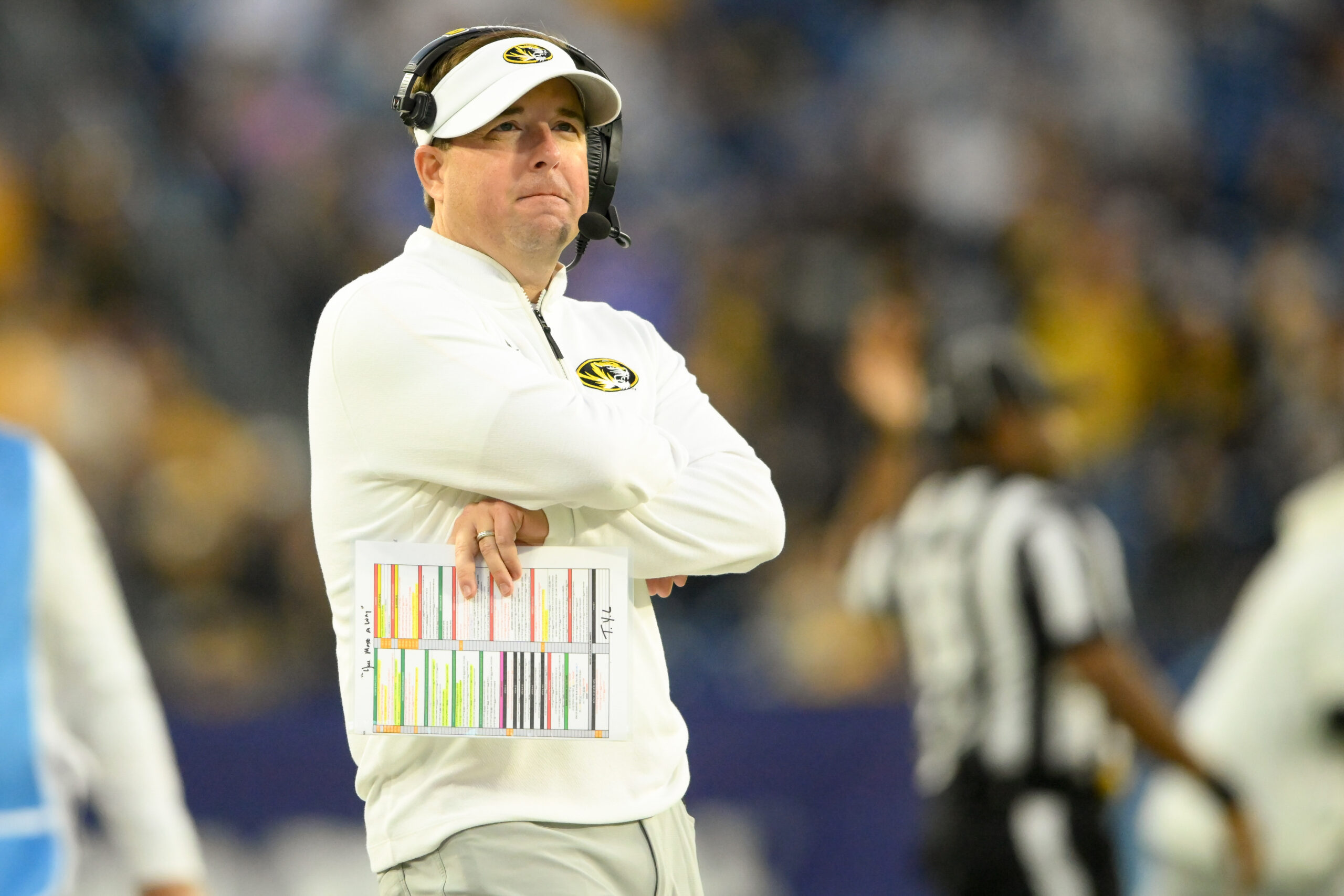 Dec 30, 2024; Nashville, TN, USA; Missouri Tigers head coach Eliah Drinkwitz watches the clock against the Iowa Hawkeyes during the second half at Nissan Stadium. Mandatory Credit: Steve Roberts-Imagn Images