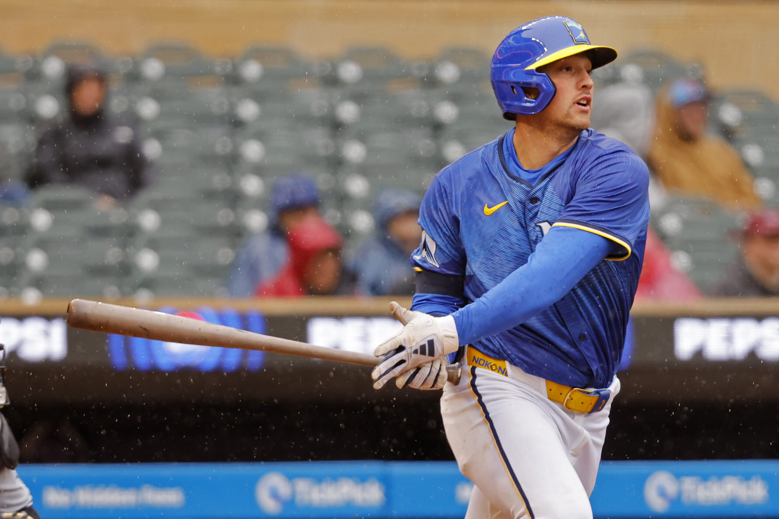 Apr 24, 2025; Minneapolis, Minnesota, USA; Minnesota Twins third baseman Brooks Lee (2) singles against the Chicago White Sox in the fifth inning at Target Field. Mandatory Credit: Bruce Kluckhohn-Imagn Images