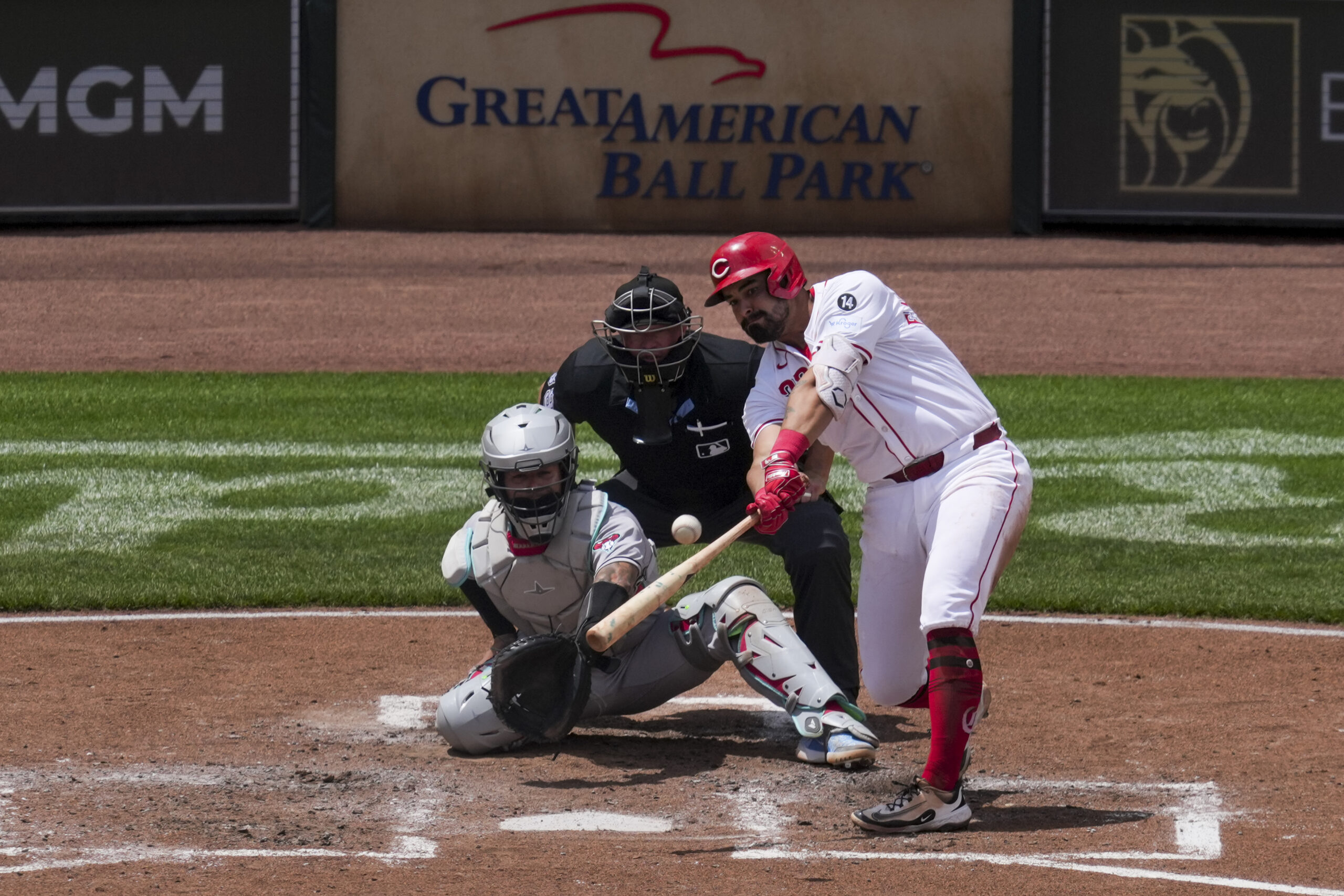 Jun 8, 2025; Cincinnati, Ohio, USA; Cincinnati Reds first baseman Christian Encarnacion-Strand (33) hits a solo home run against the Arizona Diamondbacks in the fourth inning at Great American Ball Park. Mandatory Credit: Aaron Doster-Imagn Images