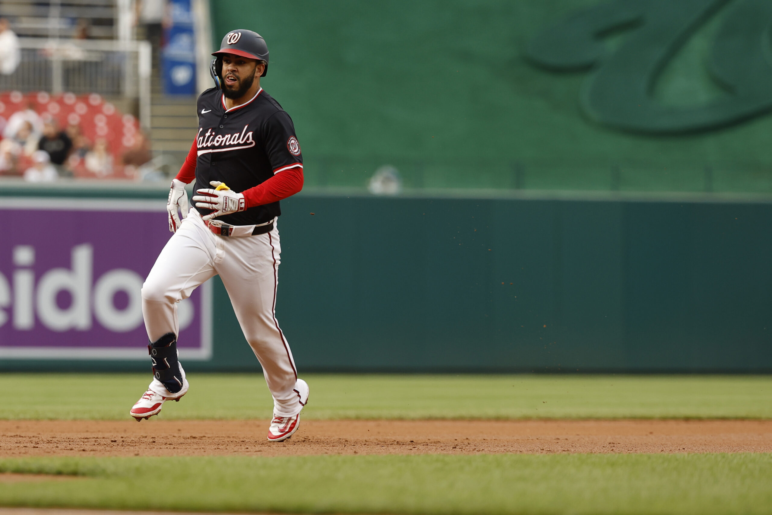 Jun 17, 2025; Washington, District of Columbia, USA; Washington Nationals second baseman Luis García Jr. (2) advances to third base on a fielding error by Colorado Rockies outfielder Brenton Doyle (not pictured) during the first inning at Nationals Park. Mandatory Credit: Geoff Burke-Imagn Images