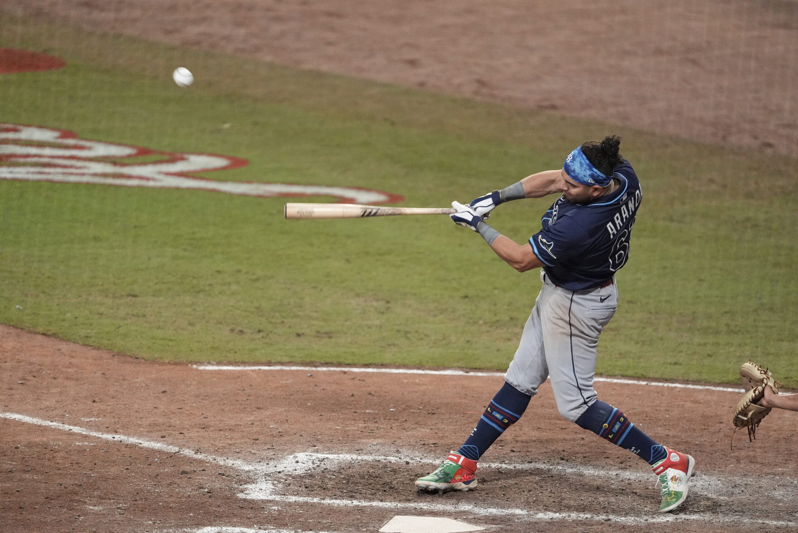 Jul 15, 2025; Cumberland, Georgia, USA; American League infielder Jonathan Aranda (62) of the Tampa Bay Rays hits a home run in the swing off after the 2025 MLB All Star Game ended in a tie at Truist Park. Mandatory Credit: Dale Zanine-Imagn Images
