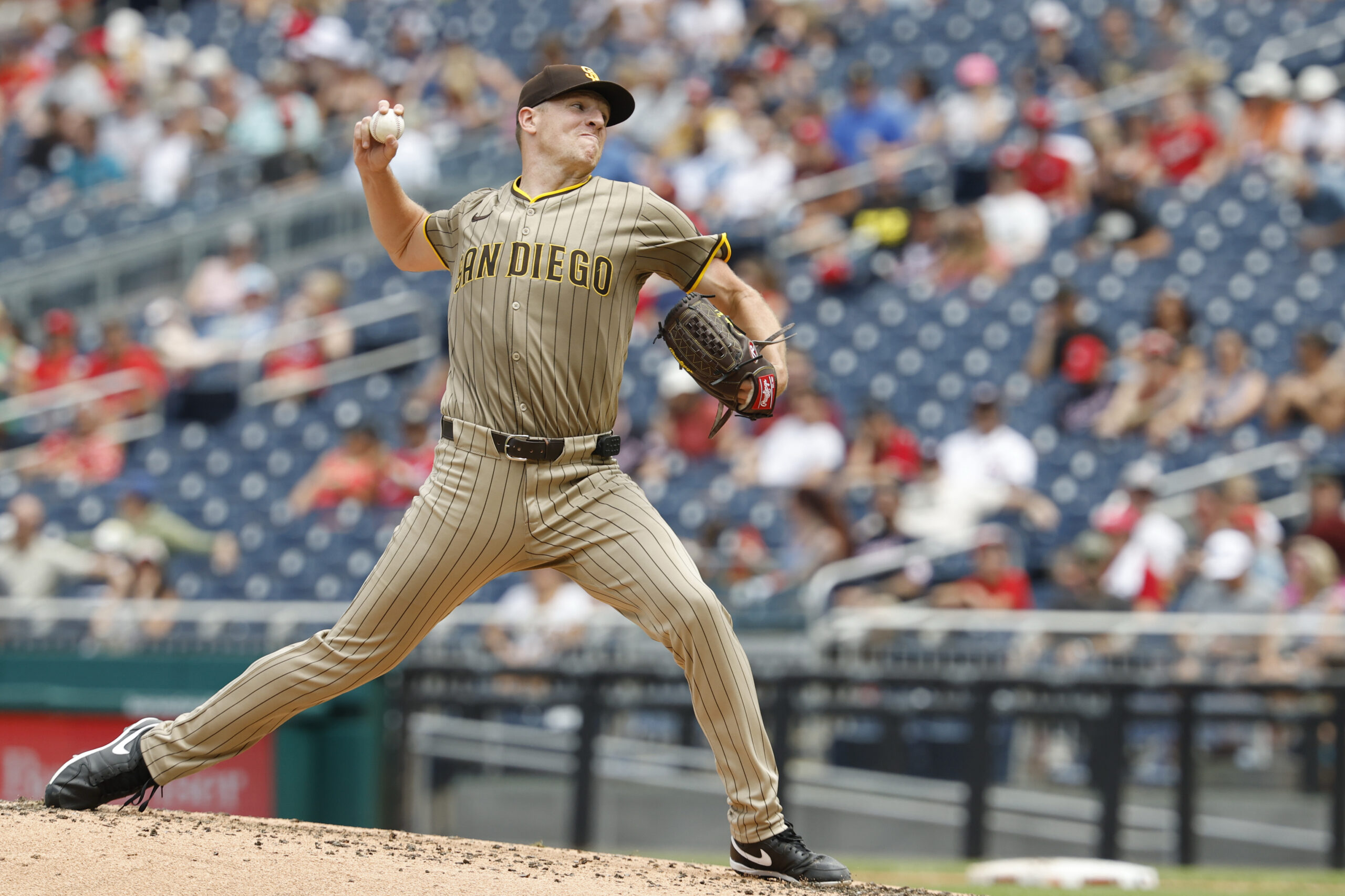 Jul 20, 2025; Washington, District of Columbia, USA; San Diego Padres starting pitcher Nick Pivetta (27) pitches against the Washington Nationals during the second inning at Nationals Park. Mandatory Credit: Geoff Burke-Imagn Images
