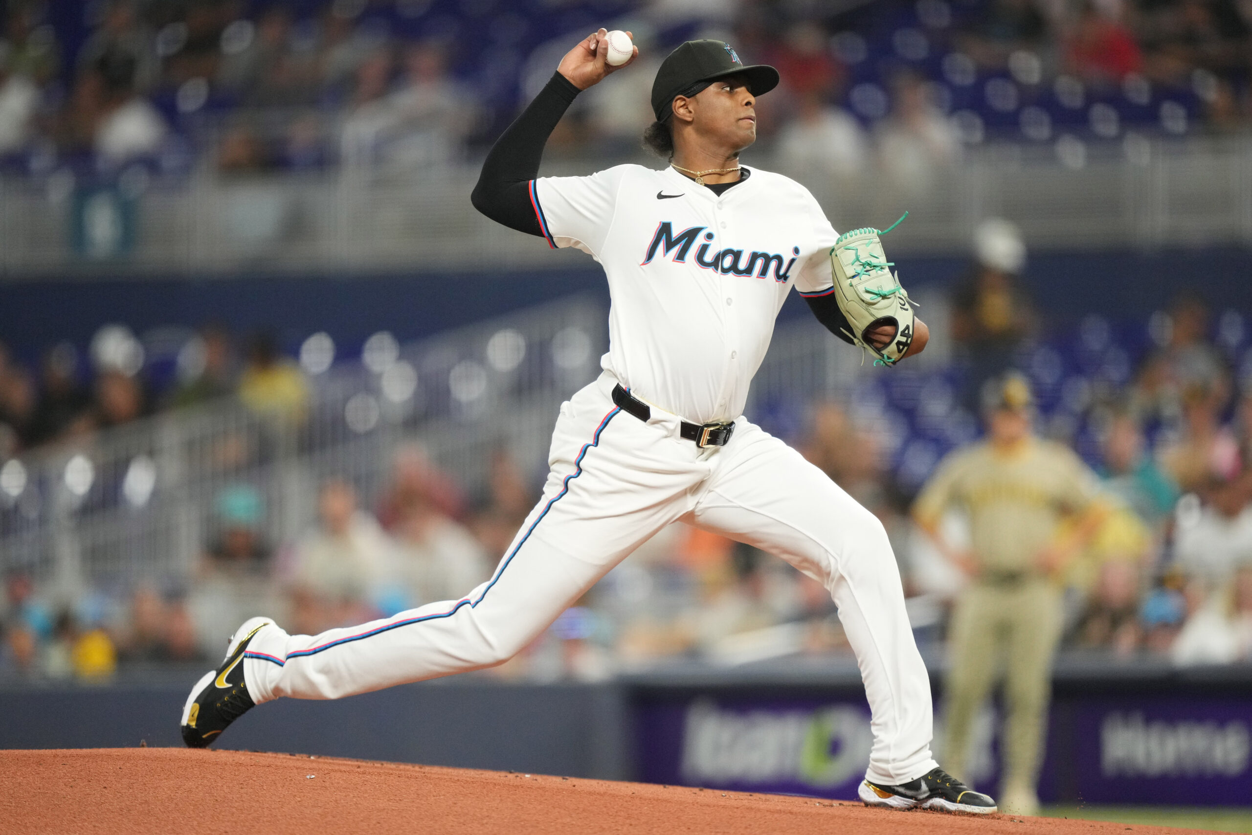 Jul 22, 2025; Miami, Florida, USA;  Miami Marlins pitcher Edward Cabrera (27) pitches in the first inning against the San Diego Padres at loanDepot Park. Mandatory Credit: Jim Rassol-Imagn Images