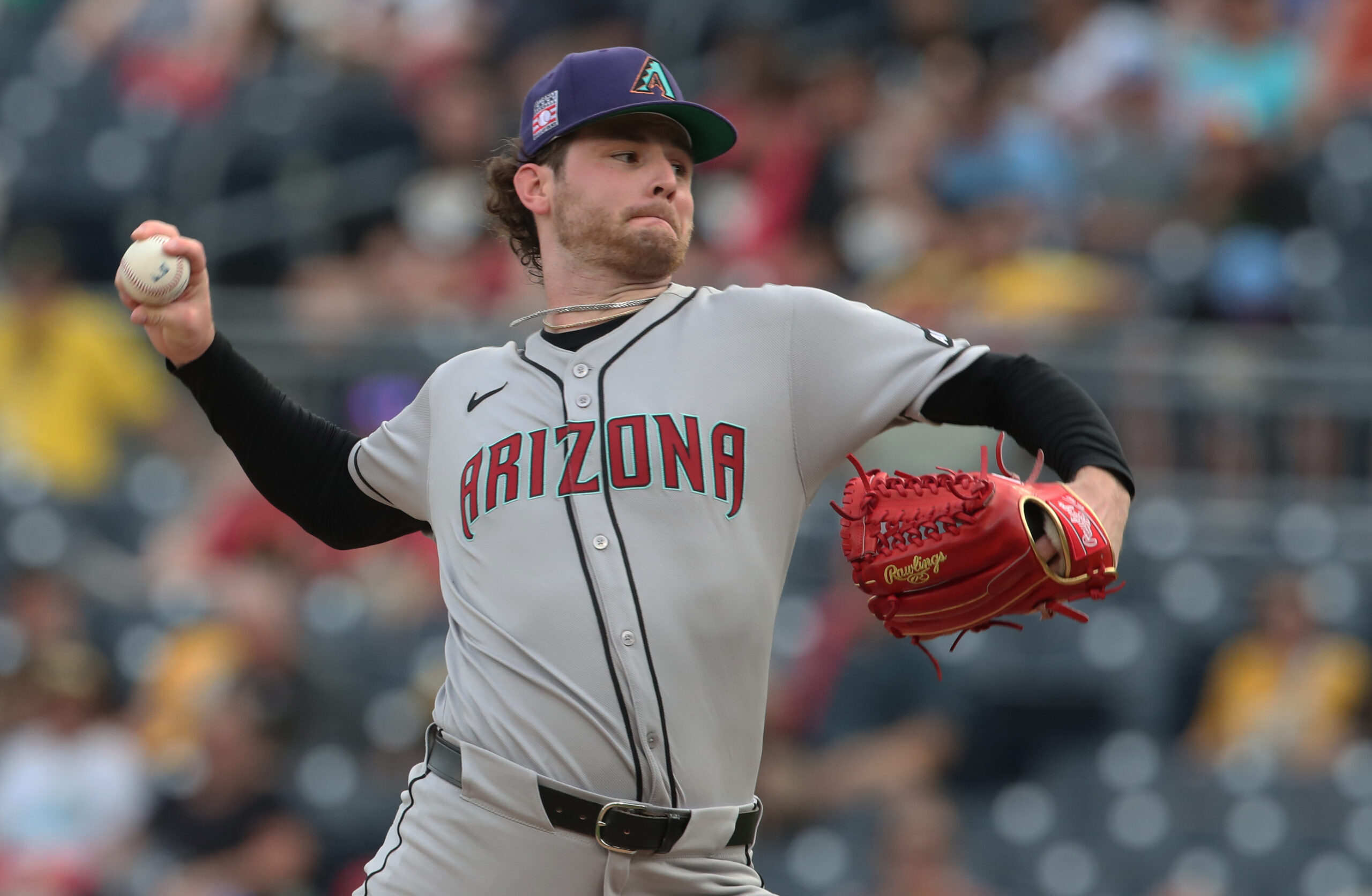 Jul 25, 2025; Pittsburgh, Pennsylvania, USA;  Arizona Diamondbacks starting pitcher Ryne Nelson (19) delivers a pitch against the Pittsburgh Pirates during the first inning at PNC Park. Mandatory Credit: Charles LeClaire-Imagn Images