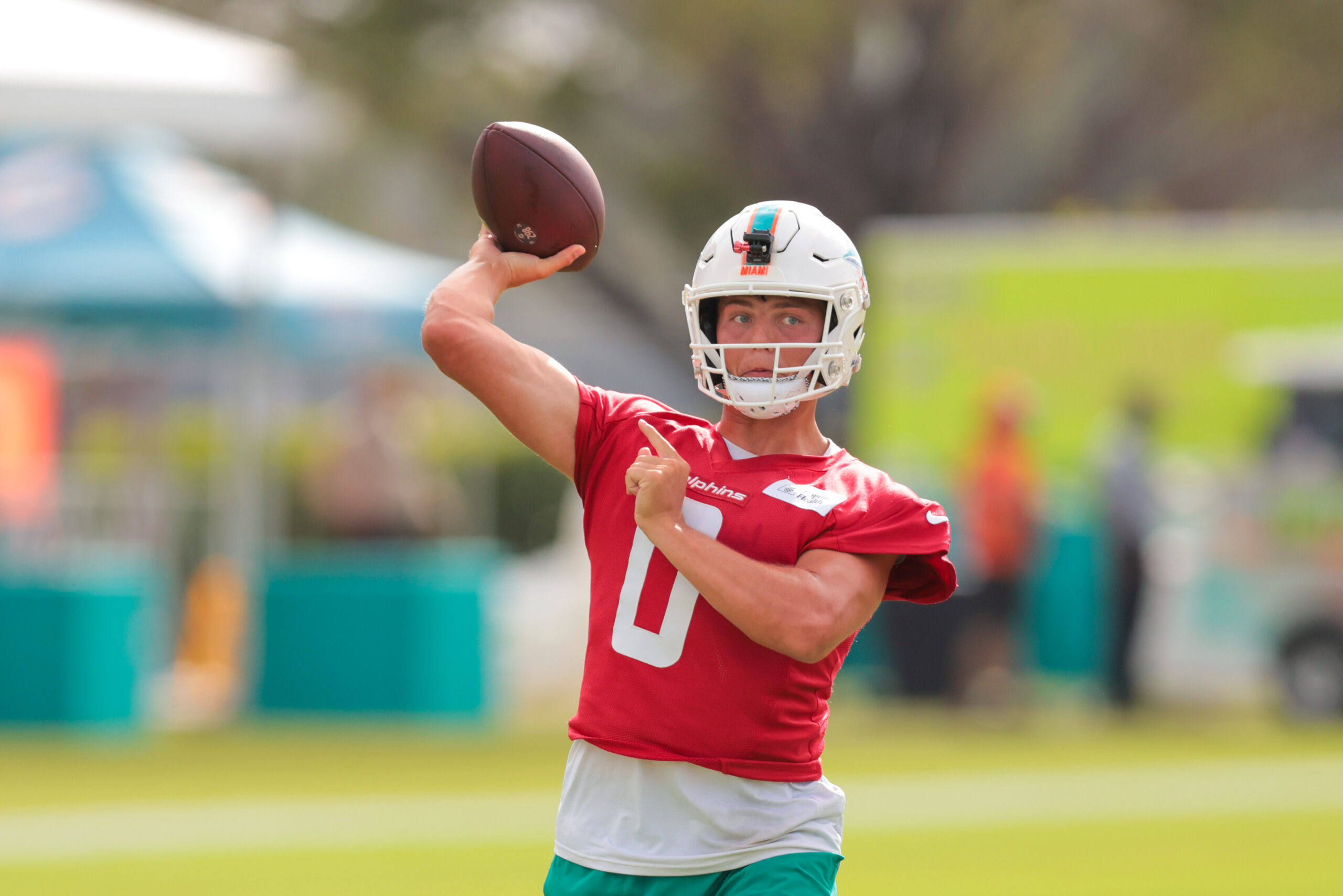 Jul 28, 2025; Miami Gardens, MI, USA; Miami Dolphins quarterback Zach Wilson (0) throws the football during training camp at Baptist Health Training Complex. Mandatory Credit: Sam Navarro-Imagn Images