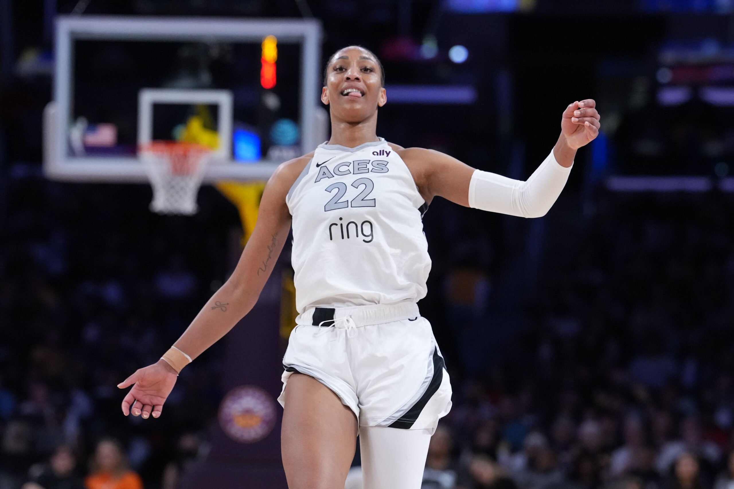 Jul 29, 2025; Los Angeles, California, USA; Las Vegas Aces center A'ja Wilson (22) reacts in the second half against the LA Sparks at Crypto.com Arena. Mandatory Credit: Kirby Lee-Imagn Images