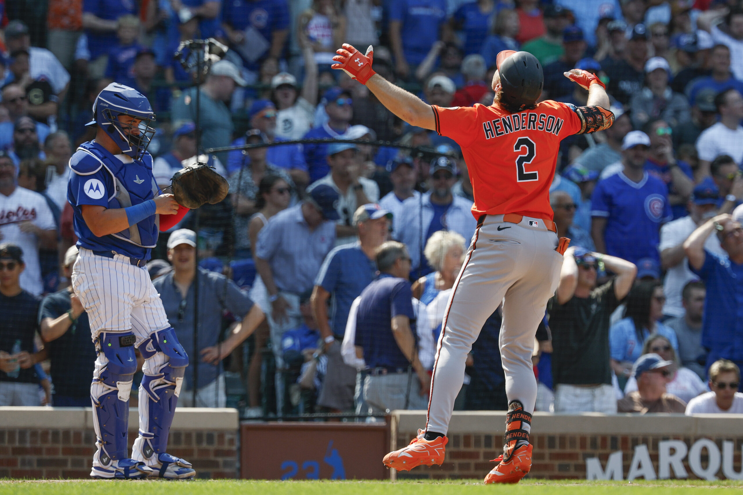 Aug 2, 2025; Chicago, Illinois, USA; Baltimore Orioles shortstop Gunnar Henderson (2) crosses home plate after hitting a three-run home run against the Chicago Cubs during the eight inning at Wrigley Field. Mandatory Credit: Kamil Krzaczynski-Imagn Images