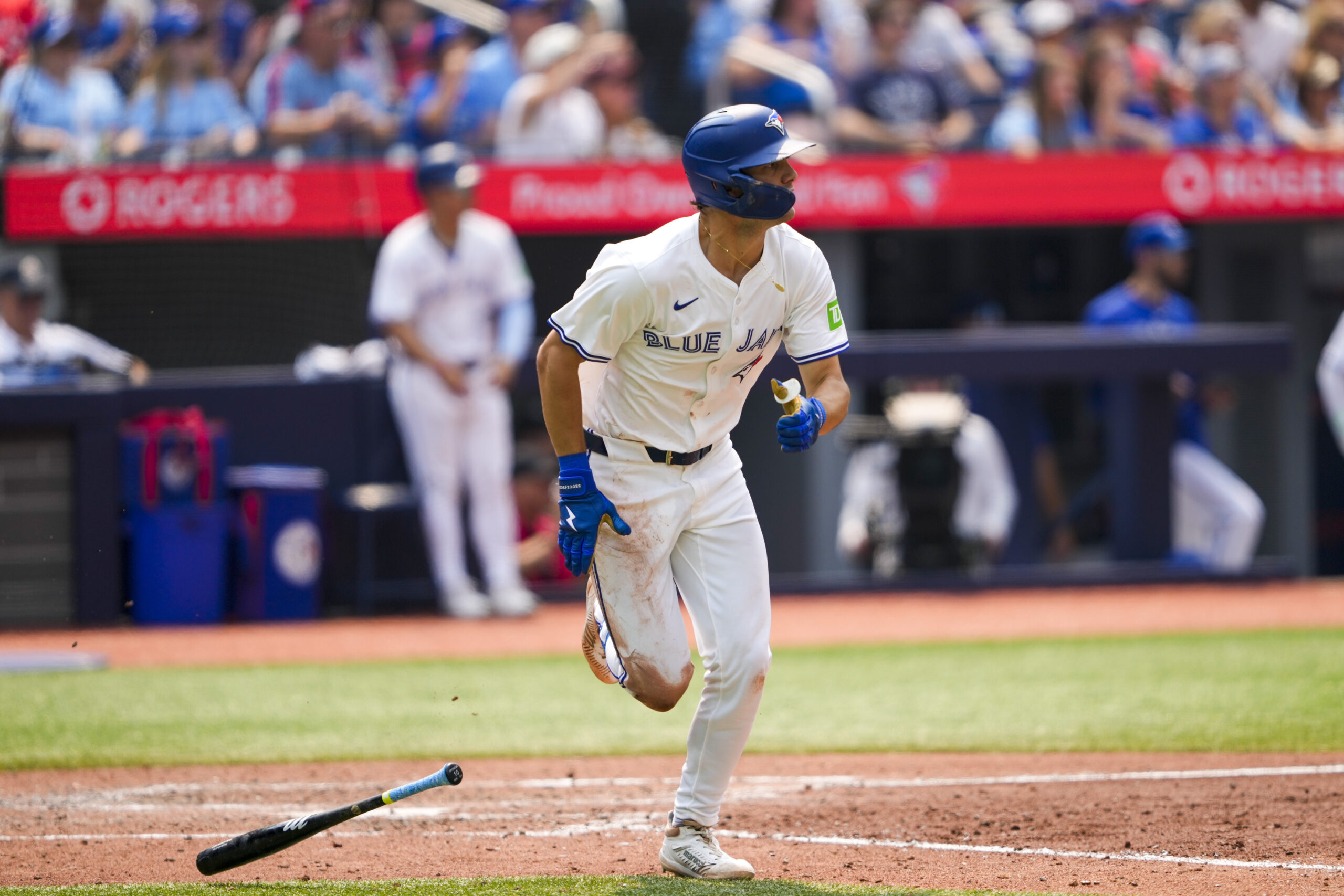 Aug 3, 2025; Toronto, Ontario, CAN; Toronto Blue Jays outfielder Joey Loperfido (10) hits a double against the Kansas City Royals during the fifth inning at Rogers Centre. Mandatory Credit: Kevin Sousa-Imagn Images