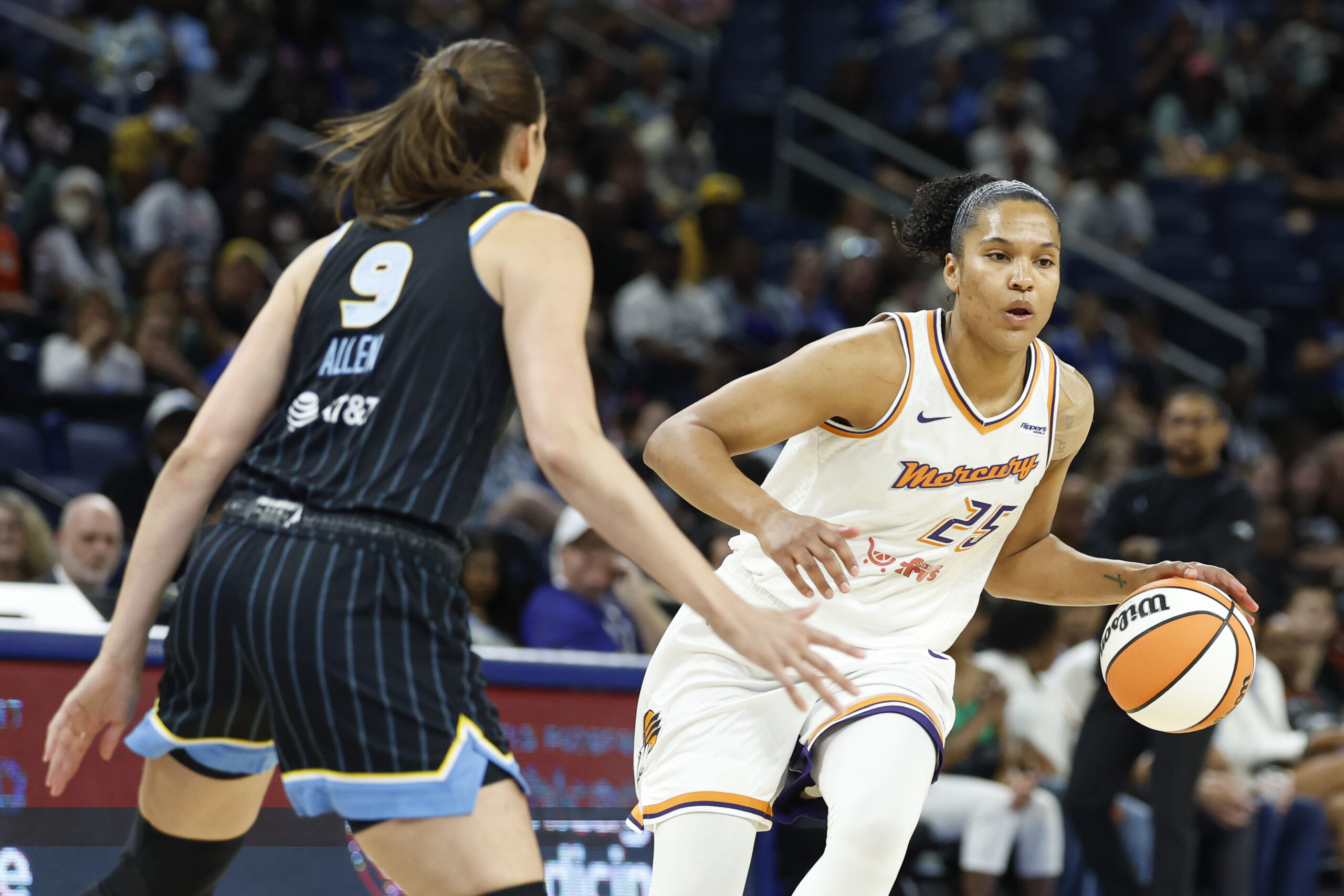 Aug 3, 2025; Chicago, Illinois, USA; Phoenix Mercury forward Alyssa Thomas (25) brings the ball up court against Chicago Sky guard Rebecca Allen (9) during the first half at Wintrust Arena. Mandatory Credit: Kamil Krzaczynski-Imagn Images