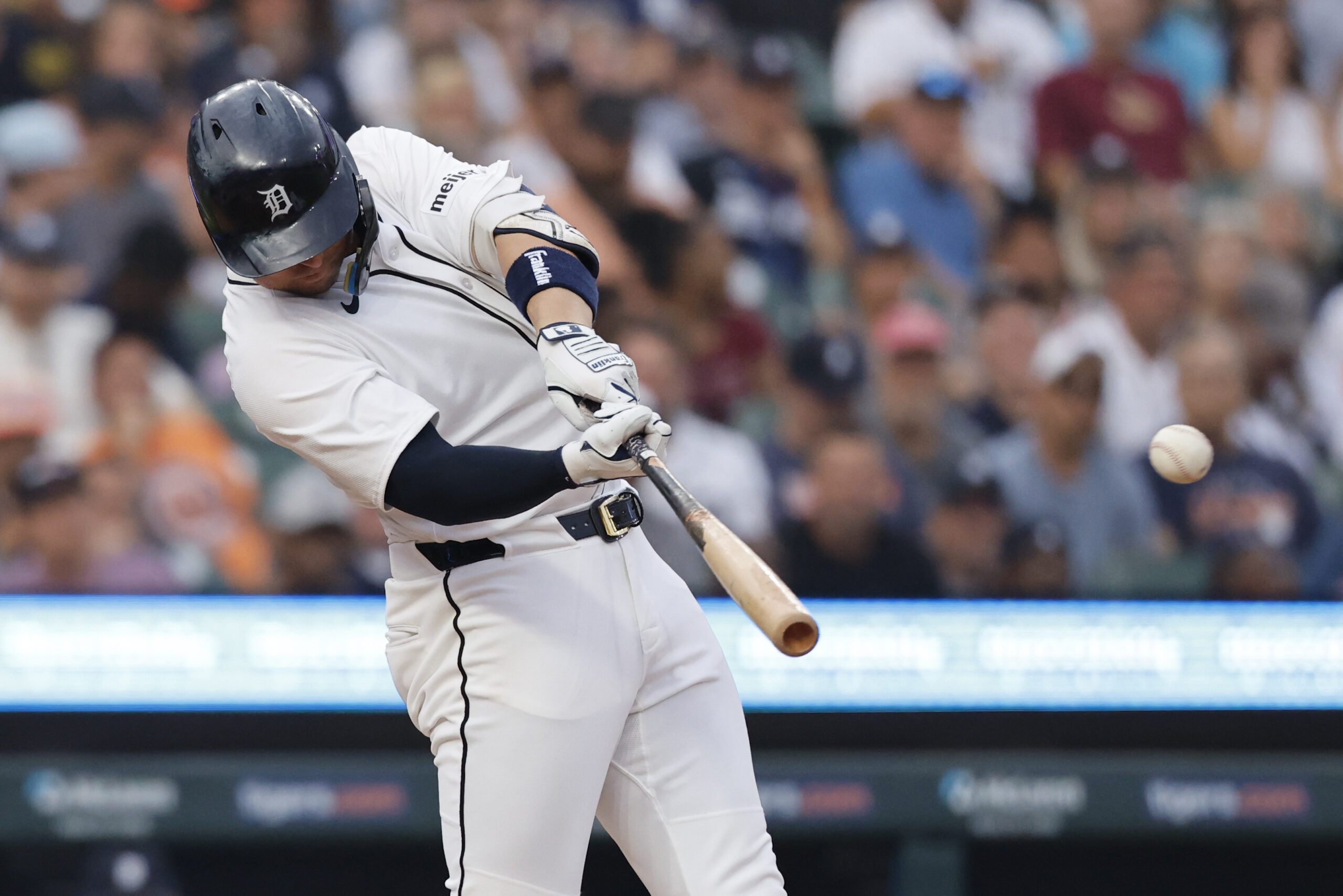 Aug 4, 2025; Detroit, Michigan, USA;  Detroit Tigers first baseman Spencer Torkelson (20) hits a single in the sixth inning against the Minnesota Twins at Comerica Park. Mandatory Credit: Rick Osentoski-Imagn Images