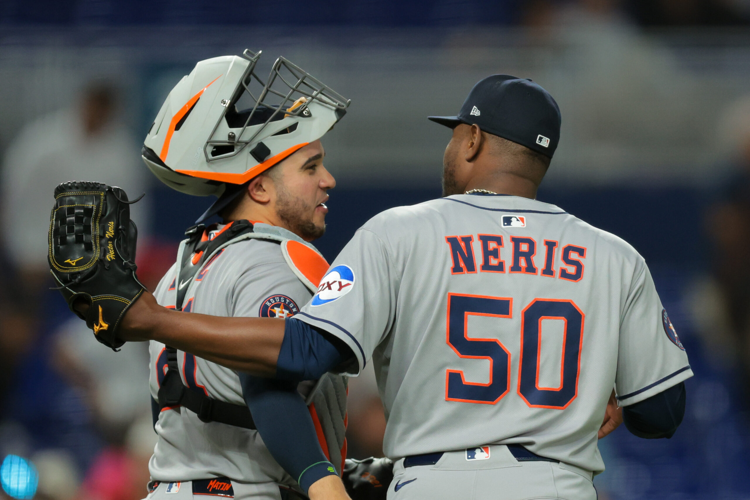 Aug 4, 2025; Miami, Florida, USA; Houston Astros relief pitcher Hector Neris (50) celebrates with catcher Yainer Diaz (21) after the game against the Miami Marlins at loanDepot Park. Mandatory Credit: Sam Navarro-Imagn Images