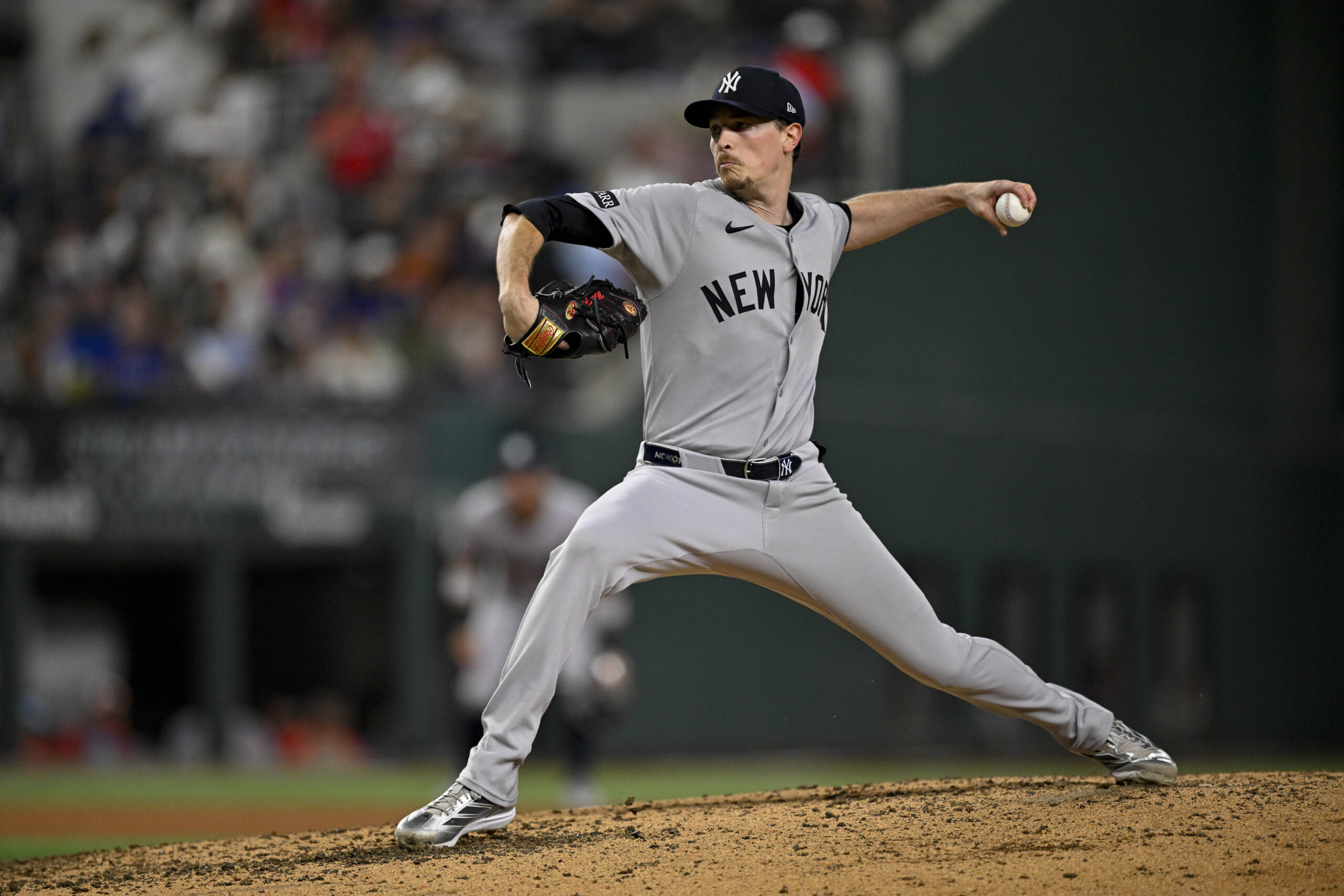 Aug 4, 2025; Arlington, Texas, USA; New York Yankees starting pitcher Max Fried (54) in action during the game between the Texas Rangers and the New York Yankees at Globe Life Field. Mandatory Credit: Jerome Miron-Imagn Images