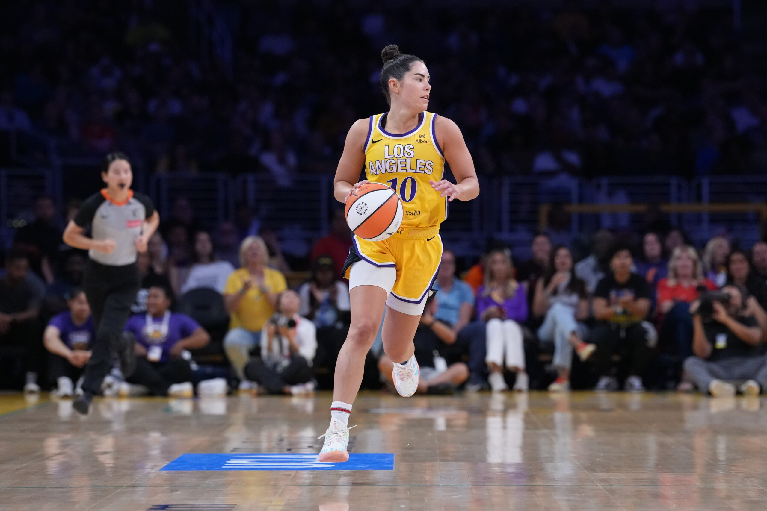 Aug 5, 2025; Los Angeles, California, USA; LA Sparks guard Kelsey Plum (10) dribbles the ball up the court in the first half against the Indiana Fever at Crypto.com Arena. Mandatory Credit: Kirby Lee-Imagn Images