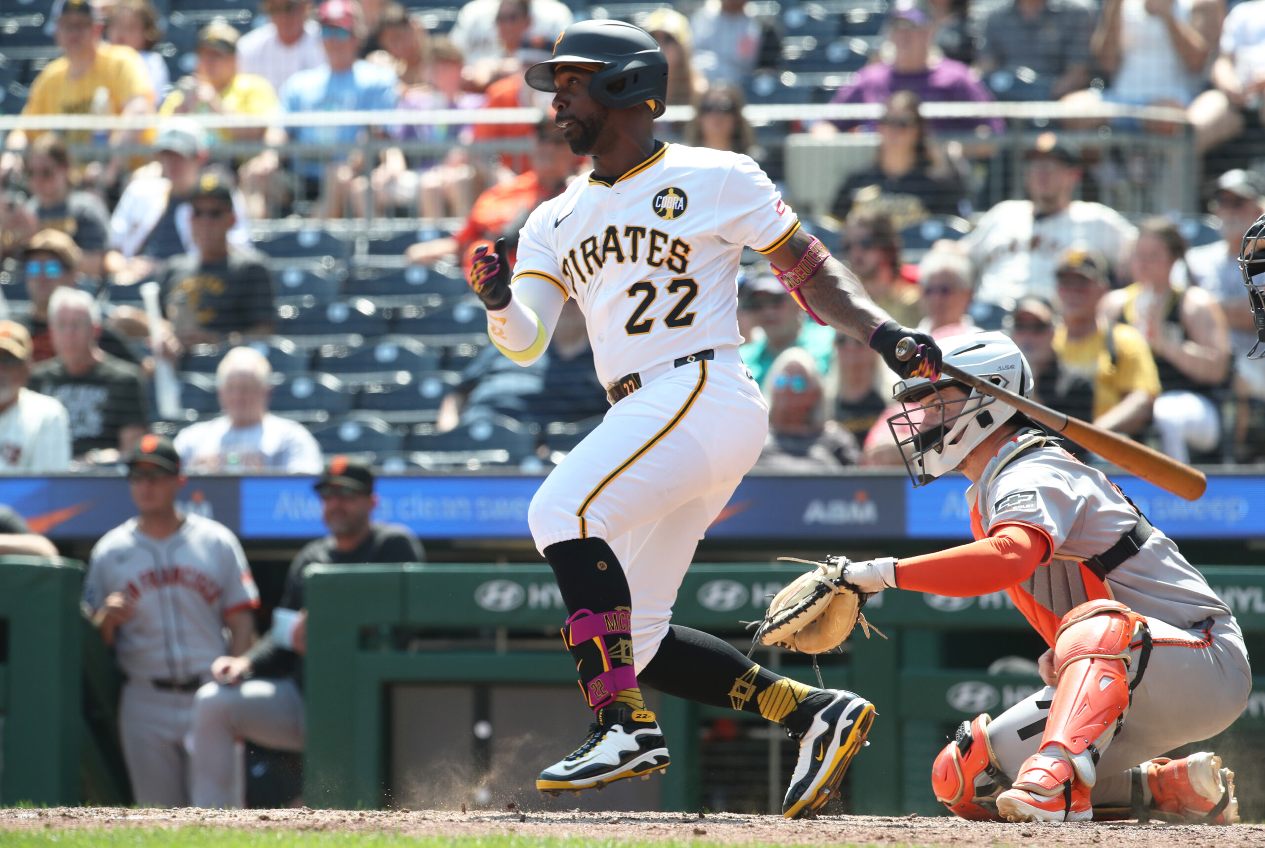 Aug 6, 2025; Pittsburgh, Pennsylvania, USA;  Pittsburgh Pirates designated hitter Andrew McCutchen (22) hits a single against the San Francisco Giants during the eighth inning at PNC Park. Mandatory Credit: Charles LeClaire-Imagn Images