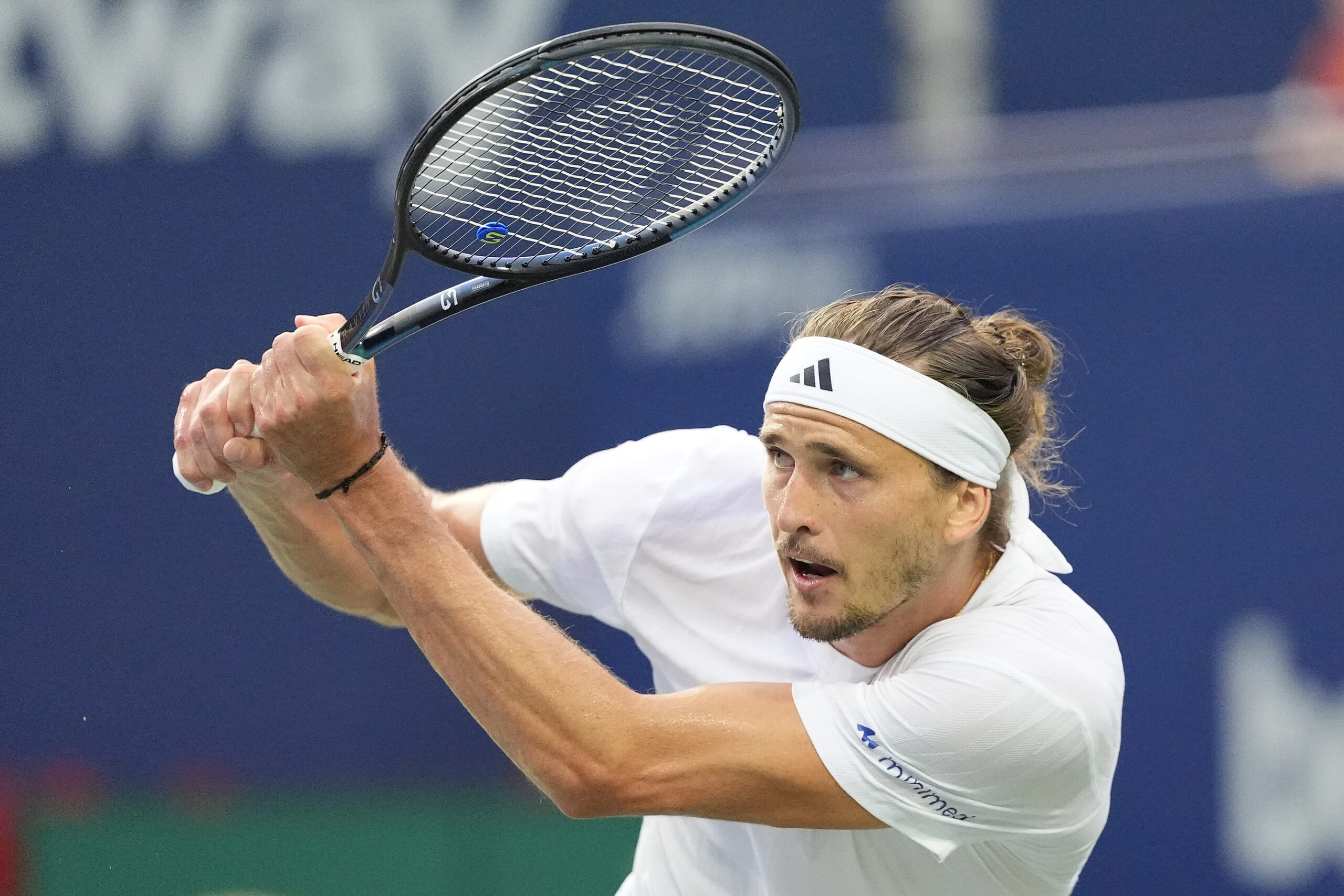 Aug 6, 2025; Toronto, ON, Canada; Alexander Zverev (GER) returns a ball to Karen Khachanov (not pictured) during semifinals at Sobeys Stadium. Mandatory Credit: John E. Sokolowski-Imagn Images