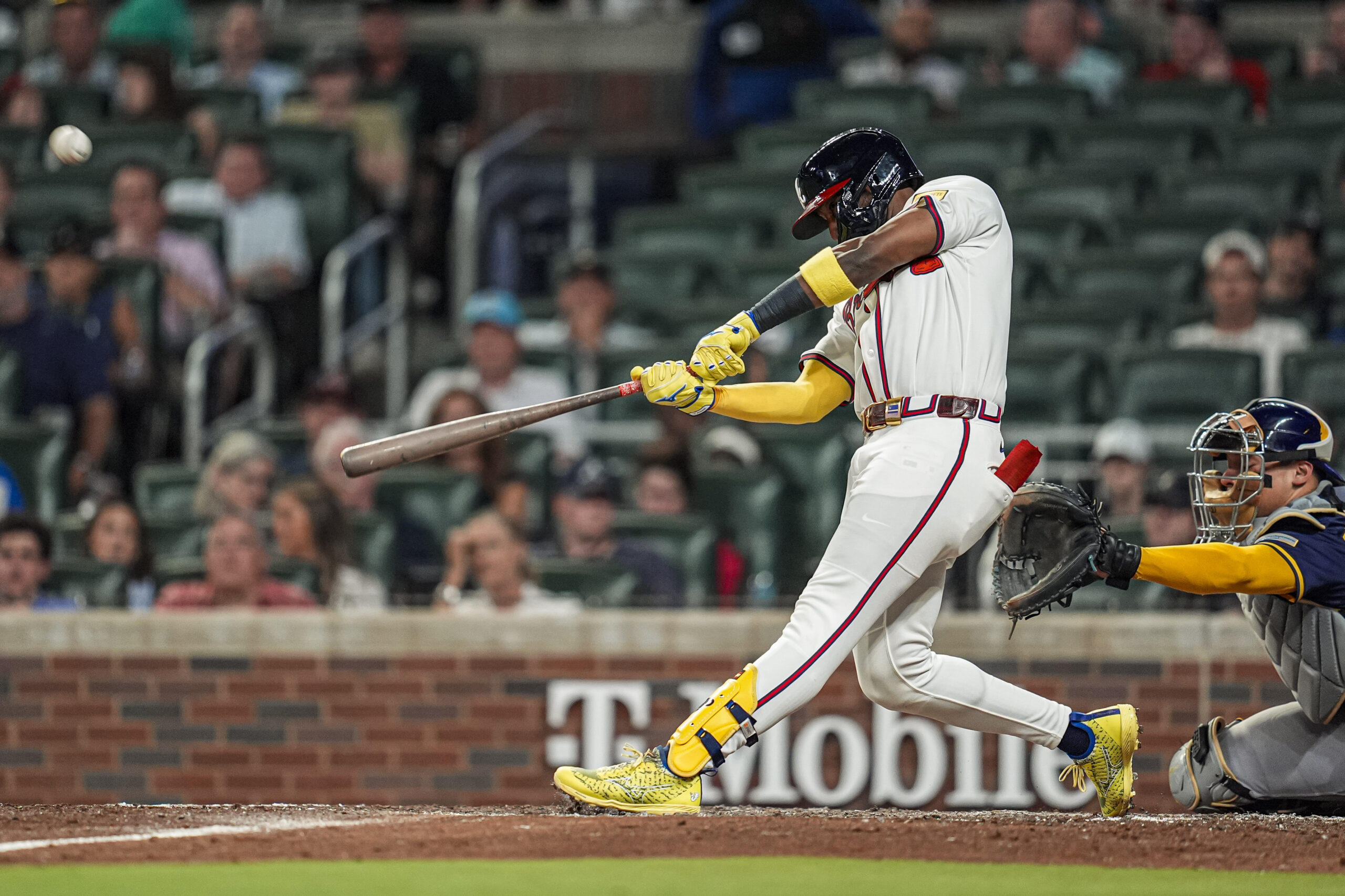 Aug 6, 2025; Cumberland, Georgia, USA; Atlanta Braves outfielder Jurickson Profar (7) hits a home run against the Milwaukee Brewers during the sixth inning at Truist Park. Mandatory Credit: Dale Zanine-Imagn Images