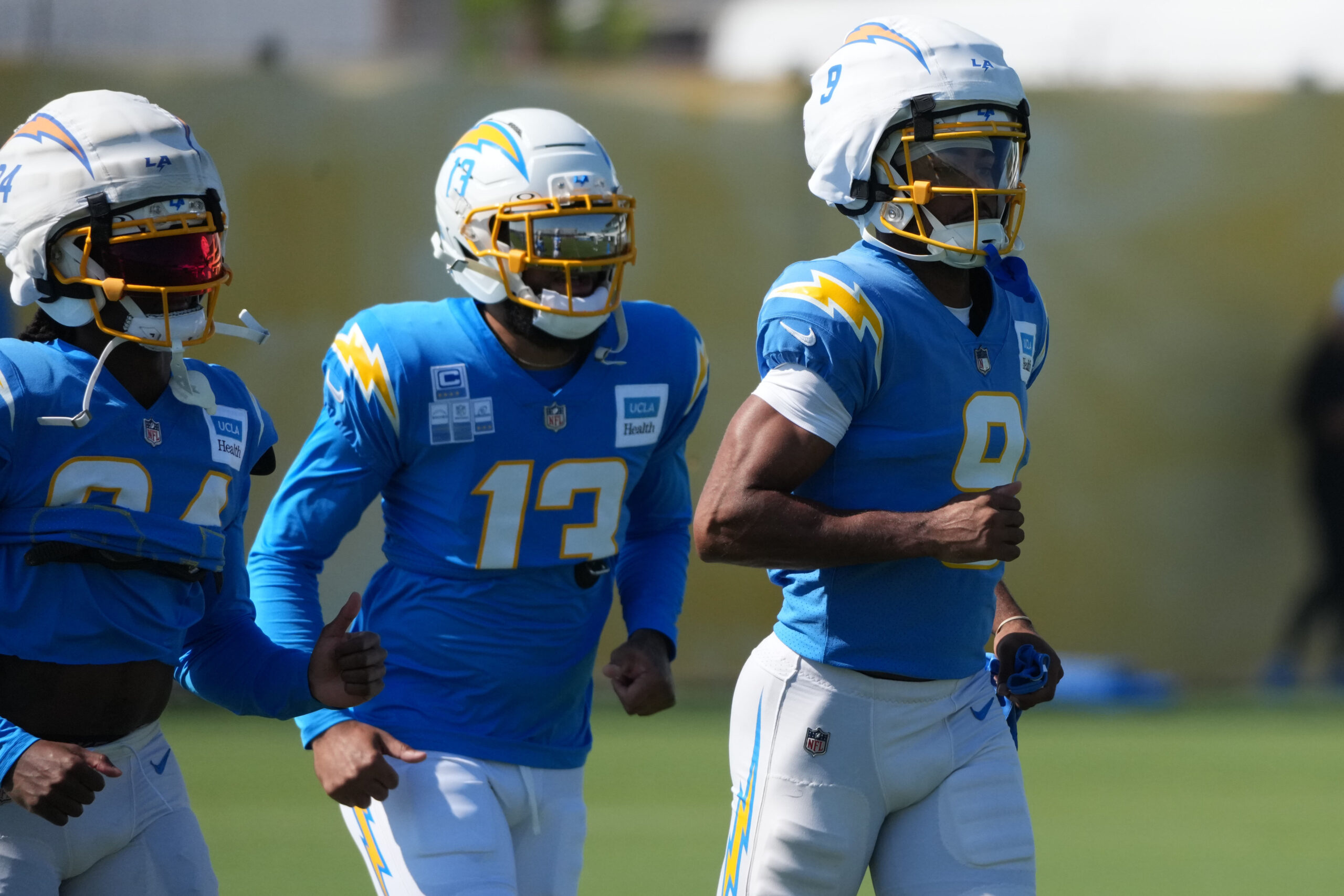 Aug 7, 2025; El Segundo, CA, USA; Los Angeles Chargers wide receiver Keenan Allen (13) and wide receiver Tre Harris (9) during training camp at The Bolt. Mandatory Credit: Kirby Lee-Imagn Images