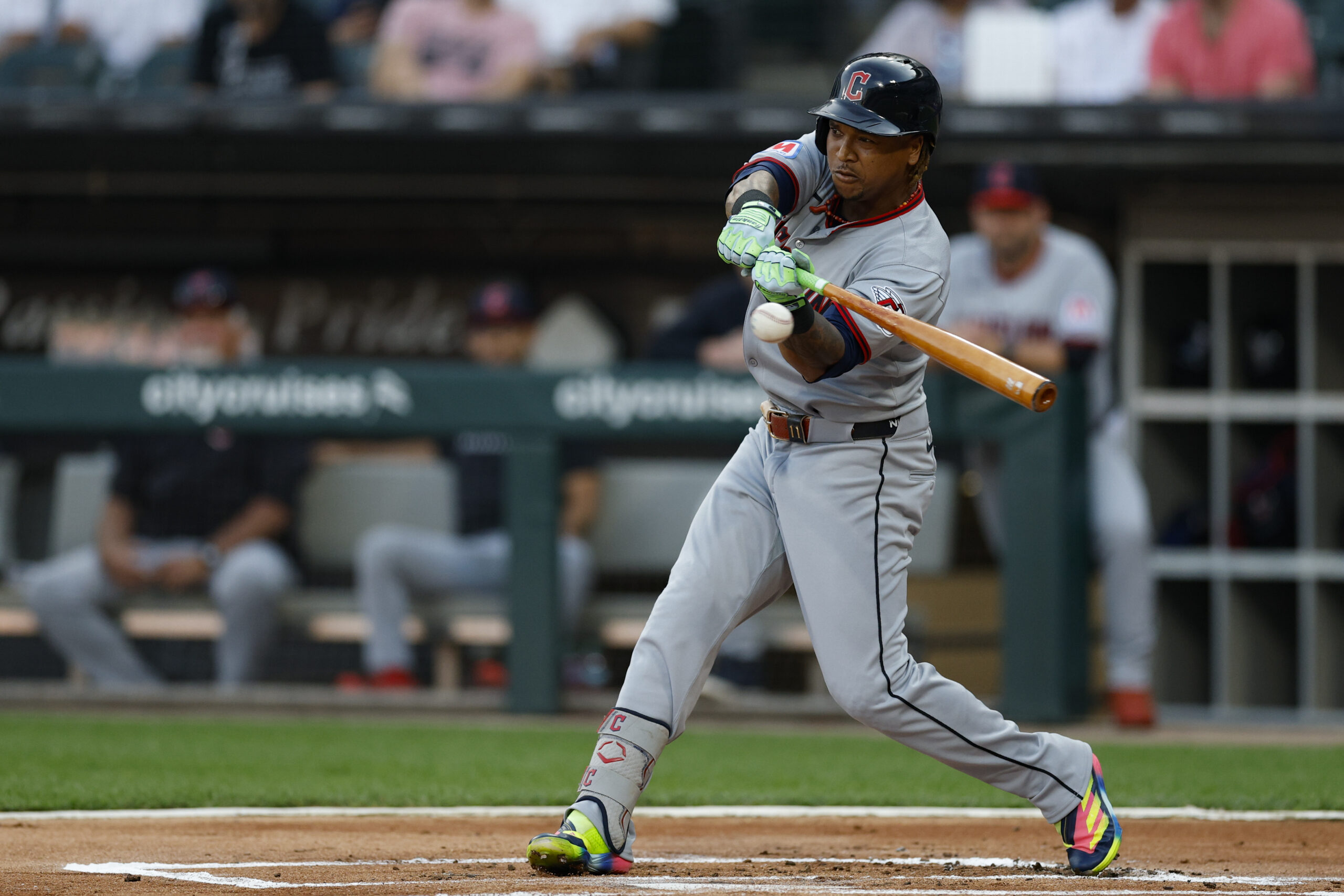 Aug 8, 2025; Chicago, Illinois, USA; Cleveland Guardians third baseman Jose Ramirez (11) hits a double against the Chicago White Sox during the first inning at Rate Field. Mandatory Credit: Kamil Krzaczynski-Imagn Images