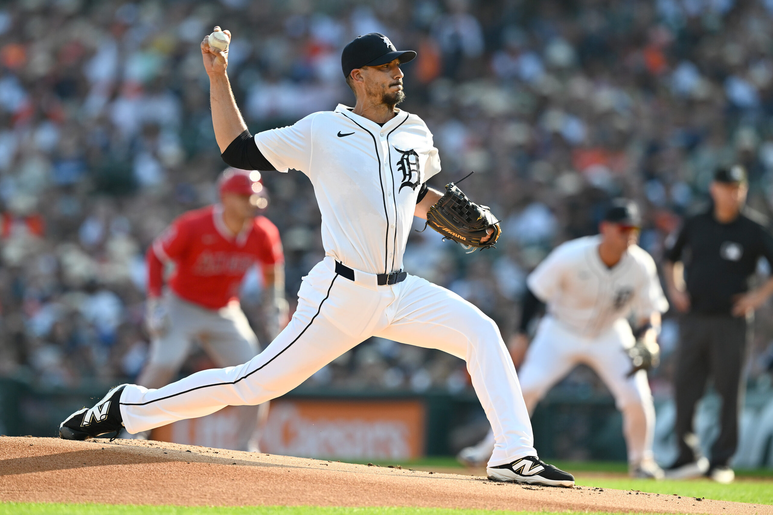 Aug 9, 2025; Detroit, Michigan, USA; Detroit Tigers starting pitcher Charlie Morton (50) throws a pitch against the Los Angeles Angels in the first inning at Comerica Park. Mandatory Credit: Lon Horwedel-Imagn Images