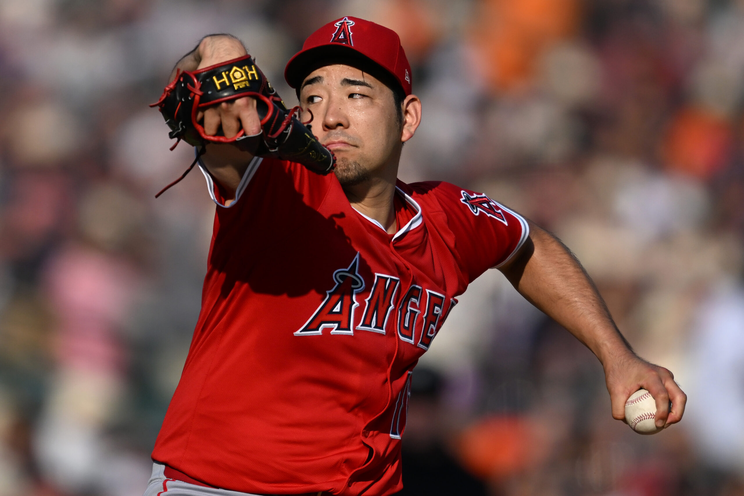 Aug 9, 2025; Detroit, Michigan, USA; Los Angeles Angels starting pitcher Yusei Kikuchi (16) throws a pitch against the Detroit Tigers in the first inning at Comerica Park. Mandatory Credit: Lon Horwedel-Imagn Images
