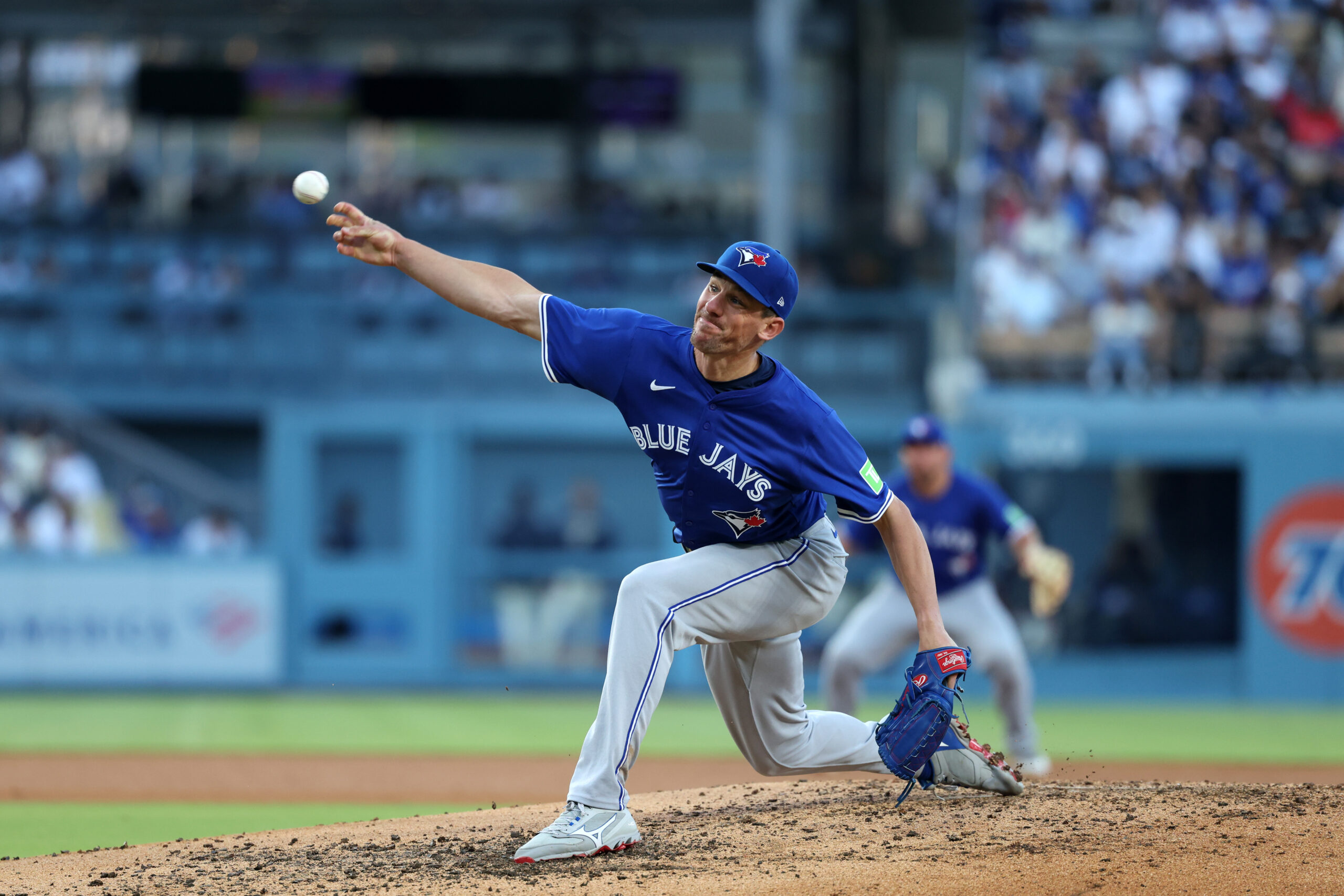Aug 9, 2025; Los Angeles, California, USA; Toronto Blue Jays starting pitcher Chris Bassitt (40) pitches during the fourth inning against the Los Angeles Dodgers at Dodger Stadium. Mandatory Credit: Kiyoshi Mio-Imagn Images