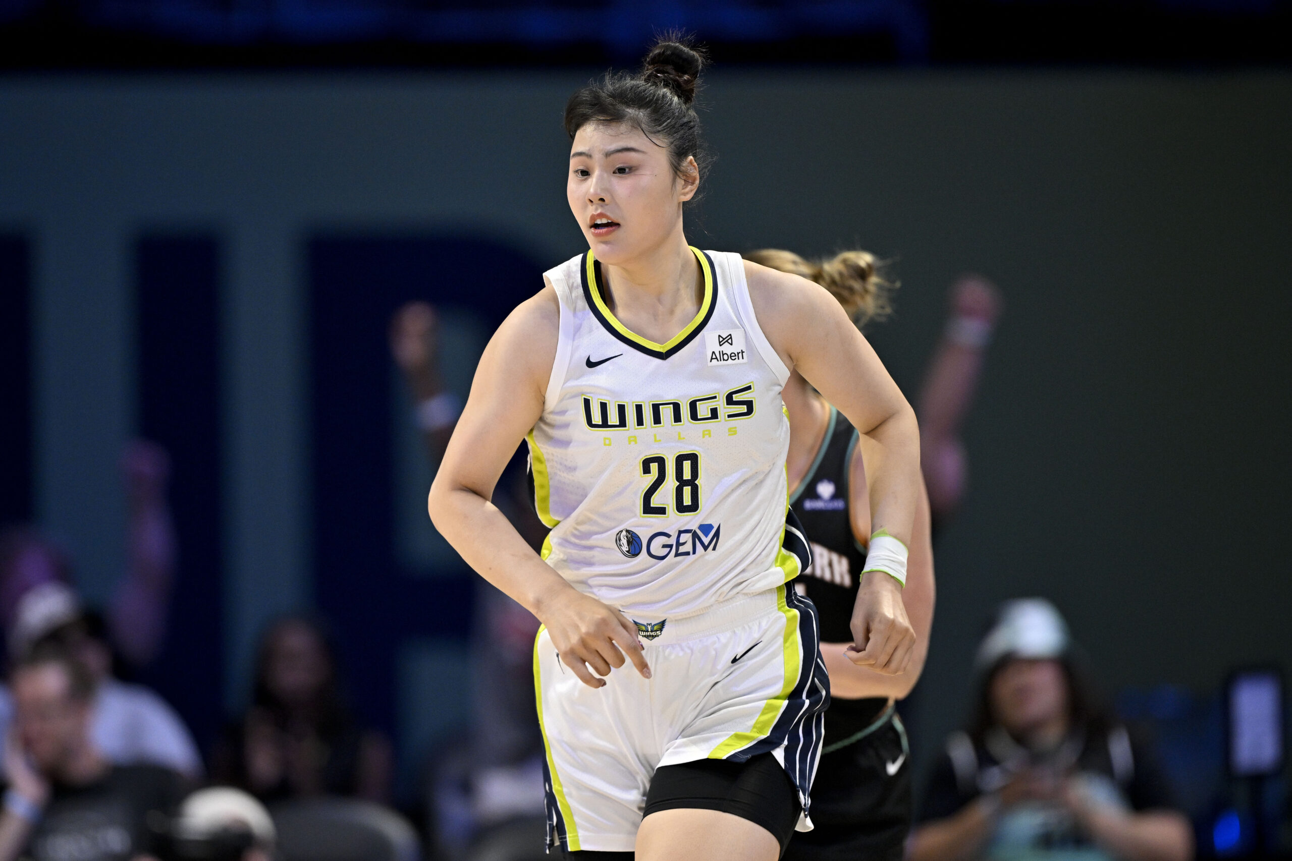 Aug 8, 2025; Arlington, Texas, USA; Dallas Wings center Li Yueru (28) in action during the game between the Dallas Wings and the New York Liberty at College Park Center. Mandatory Credit: Jerome Miron-Imagn Images