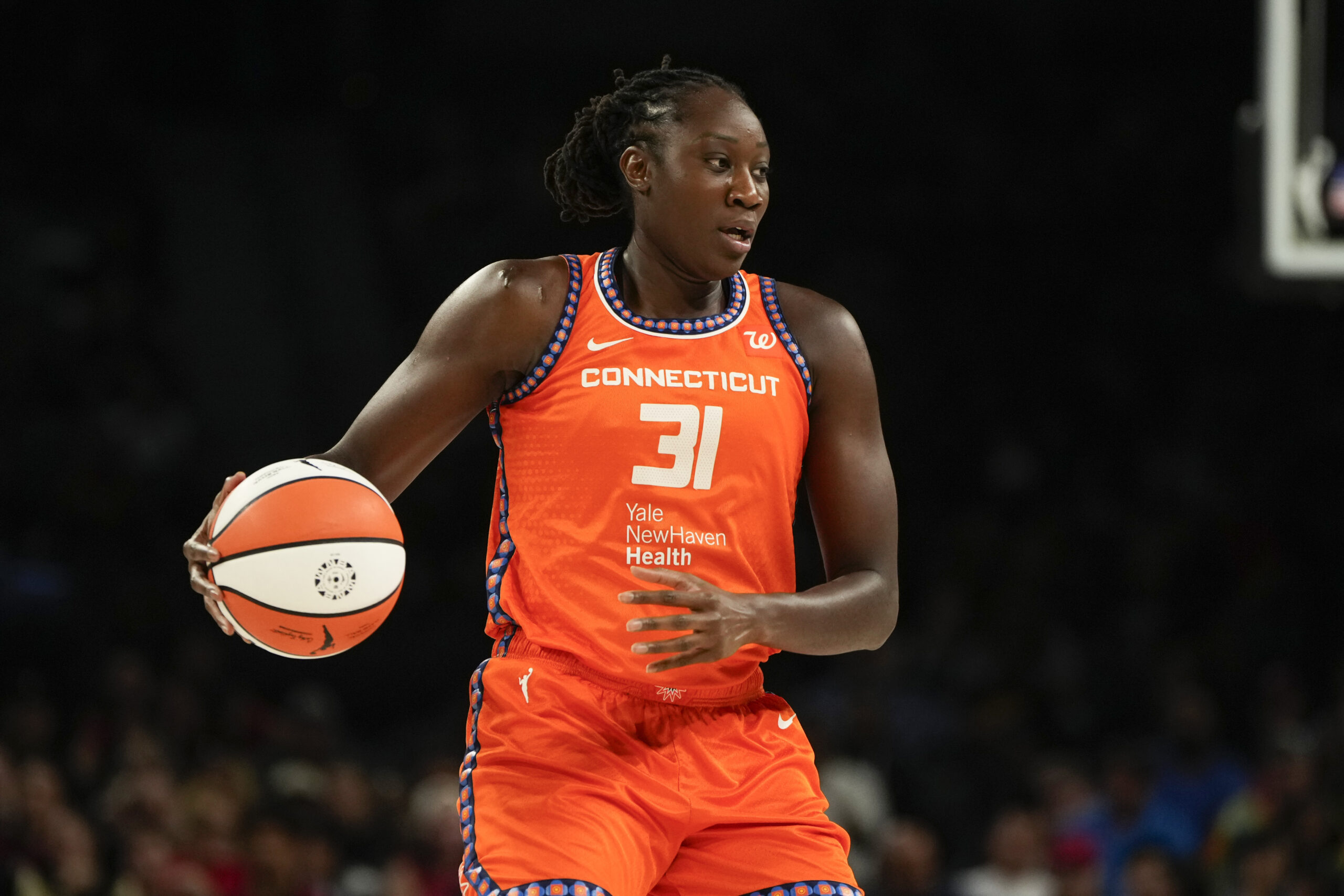 Aug 10, 2025; Las Vegas, Nevada, USA; Connecticut Sun center Tina Charles (31) dribbles the ball against the Las Vegas Aces during the first half of a WNBA basketball game at Michelob Ultra Arena. Mandatory Credit: Lucas Peltier-Imagn Images