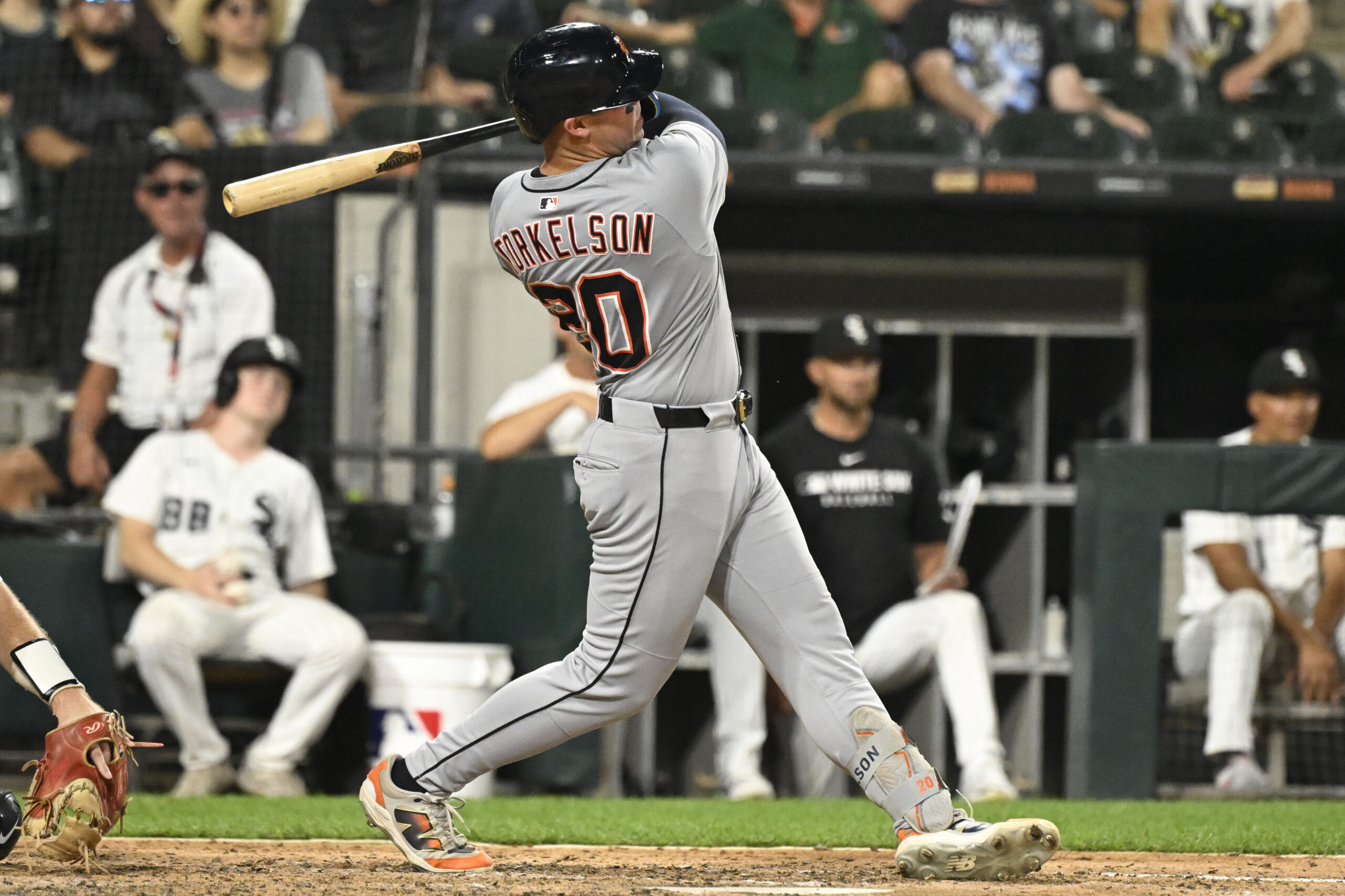 Aug 11, 2025; Chicago, Illinois, USA;  Detroit Tigers first base Spencer Torkelson (20) hits a home run during the ninth inning against the Chicago White Sox at Rate Field. Mandatory Credit: Matt Marton-Imagn Images