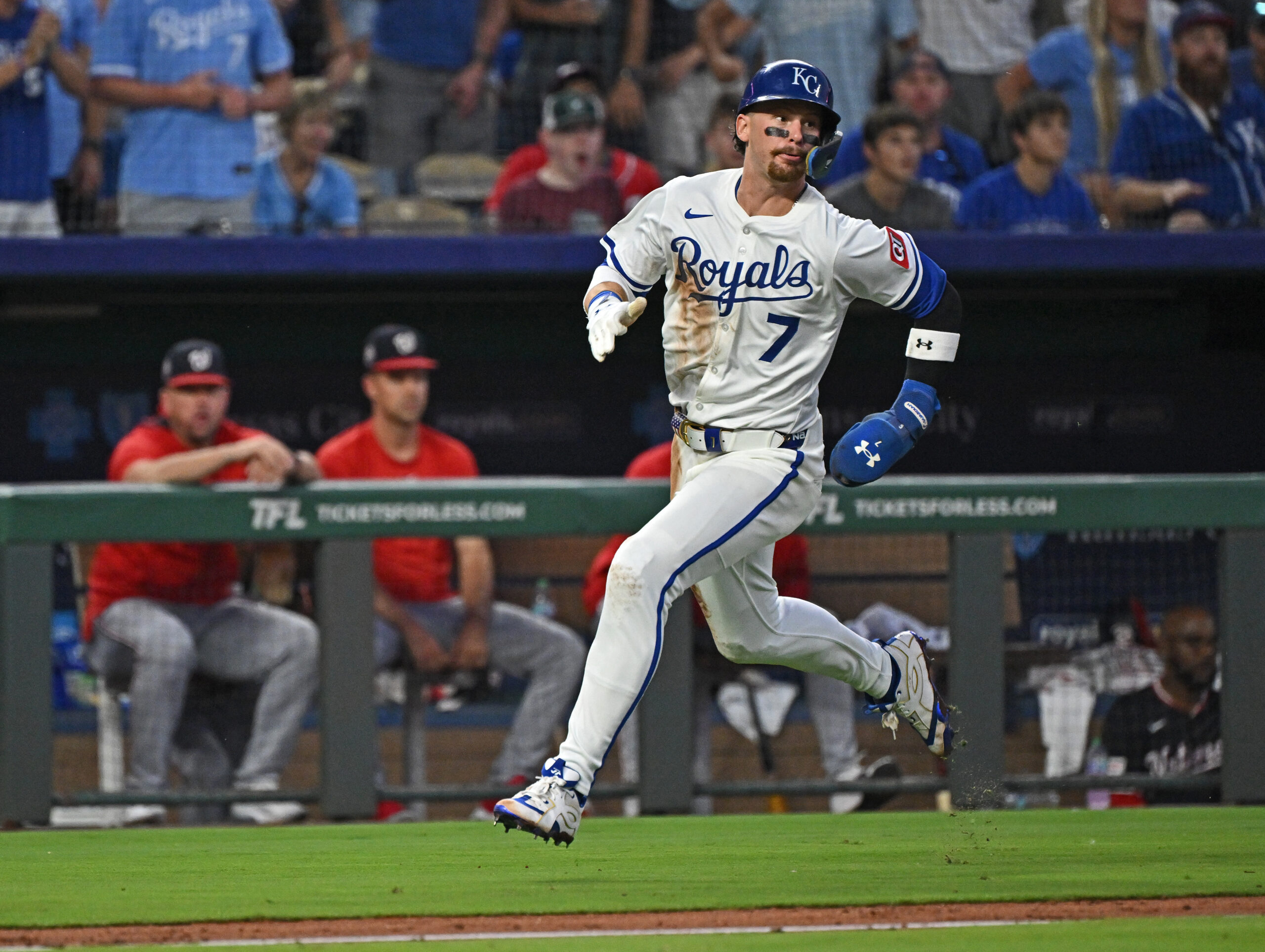 Aug 12, 2025; Kansas City, Missouri, USA;  Kansas City Royals shortstop Bobby Witt Jr. (7) scores a run in the sixth inning against the Washington Nationals at Kauffman Stadium. Mandatory Credit: Peter Aiken-Imagn Images