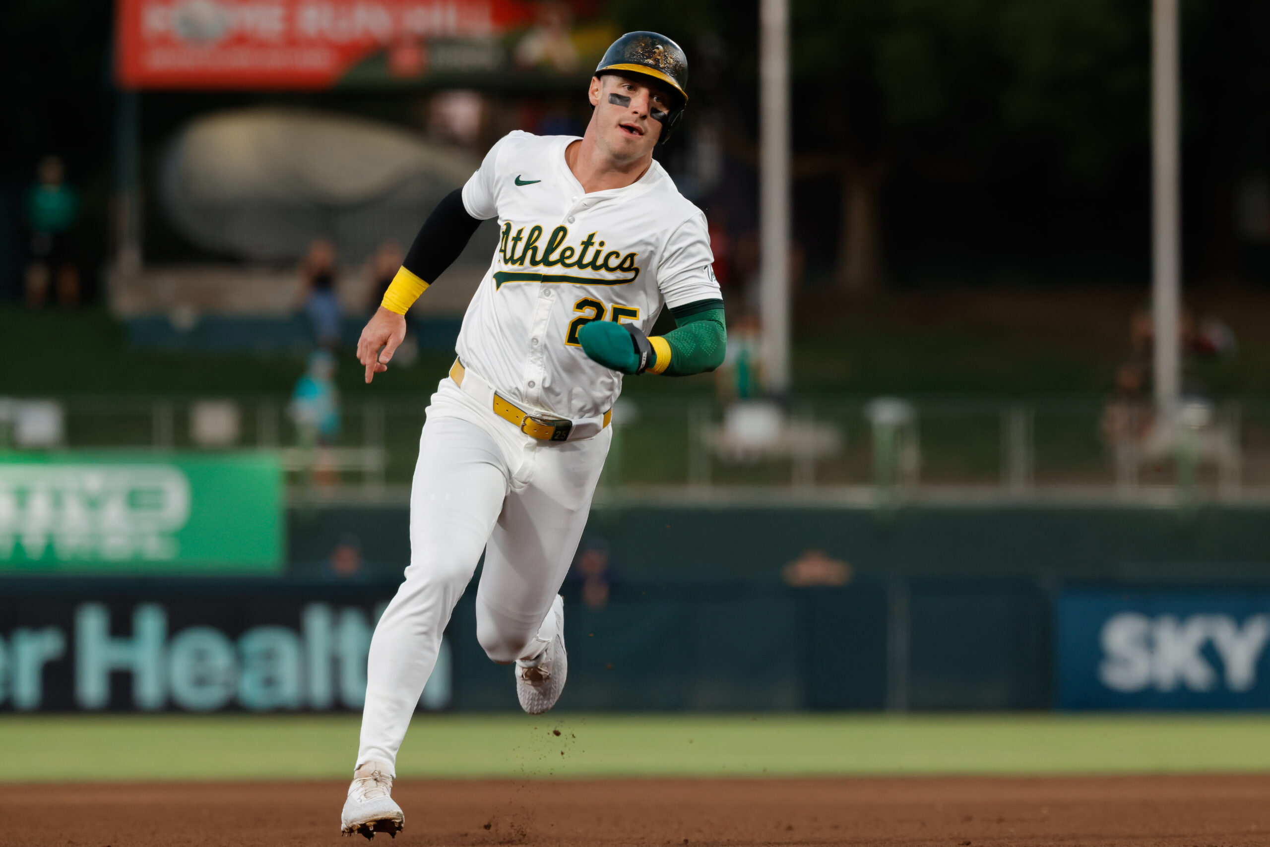 Aug 12, 2025; West Sacramento, California, USA; Athletics designated hitter Brent Rooker (25) advances to third base on a double by Tyler Soderstrom during the fourth inning against the Tampa Bay Rays at Sutter Health Park. Mandatory Credit: Sergio Estrada-Imagn Images