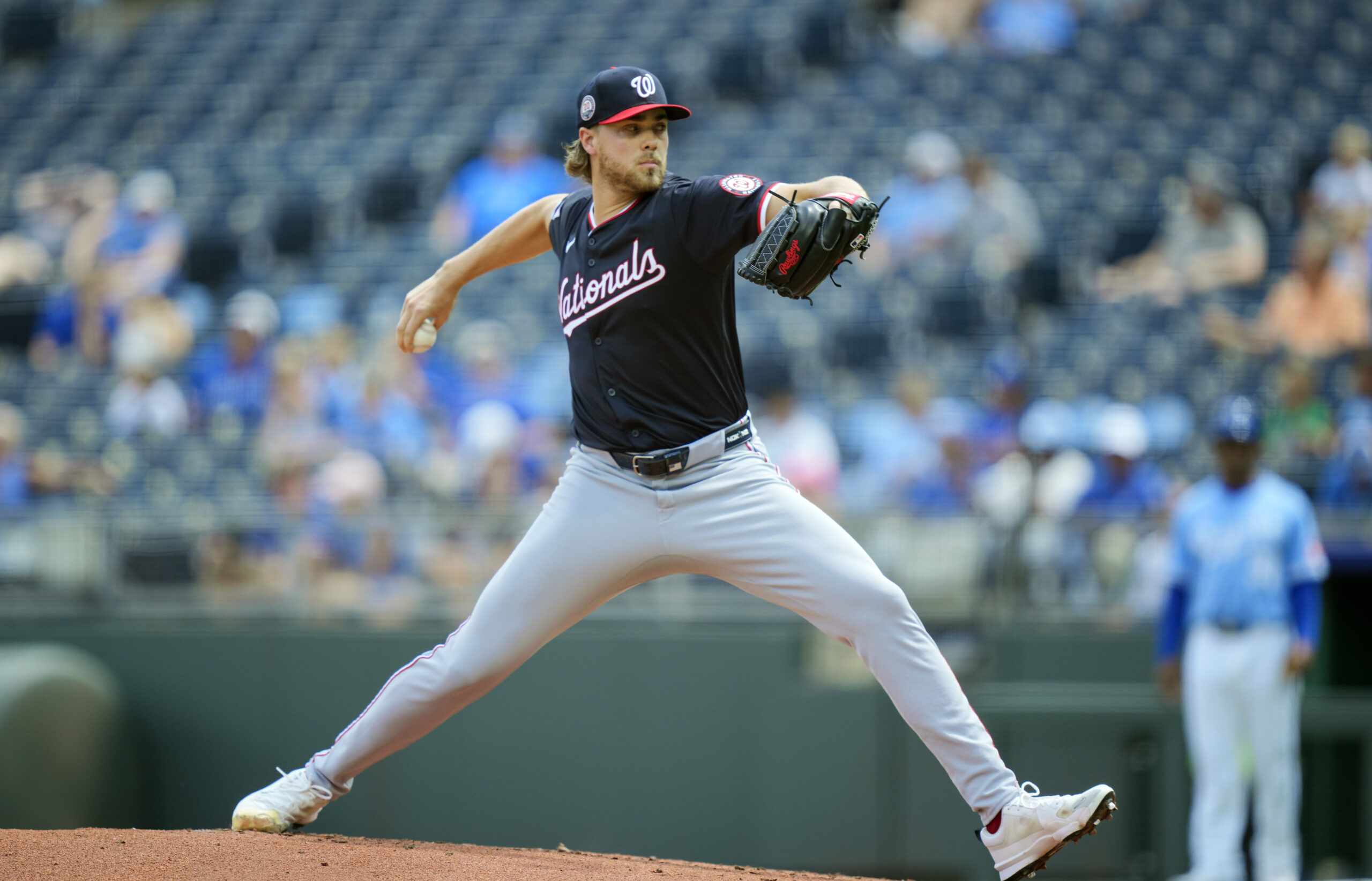 Aug 13, 2025; Kansas City, Missouri, USA; Washington Nationals starting pitcher Jake Irvin (27) pitches during the first inning against the Kansas City Royals at Kauffman Stadium. Mandatory Credit: Jay Biggerstaff-Imagn Images