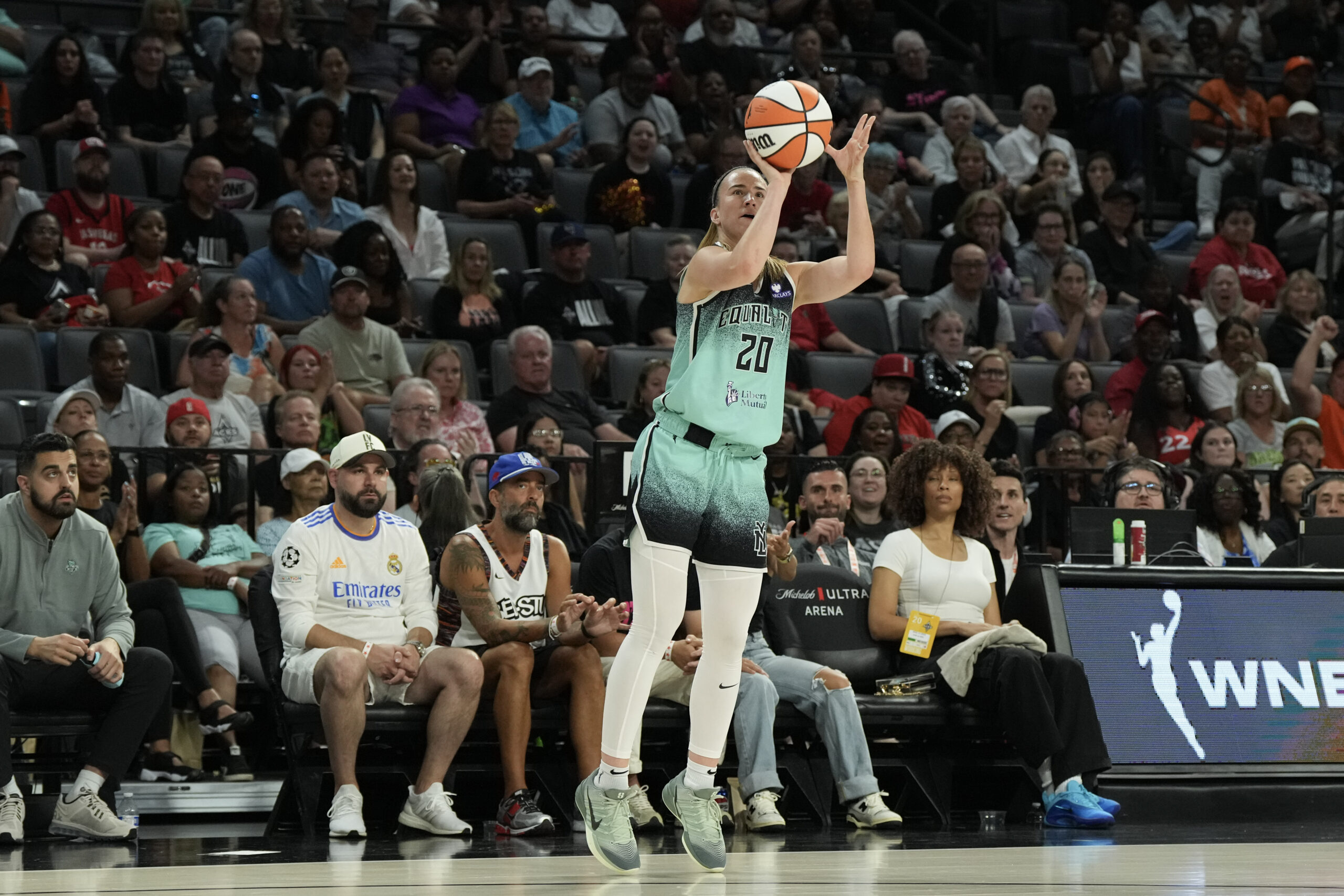 Aug 13, 2025; Las Vegas, Nevada, USA; New York Liberty guard Sabrina Ionescu (20) shoots a 3-pointer against the Las Vegas Aces during the fourth quarter of their game at Michelob Ultra Arena. Mandatory Credit: Candice Ward-Imagn Images