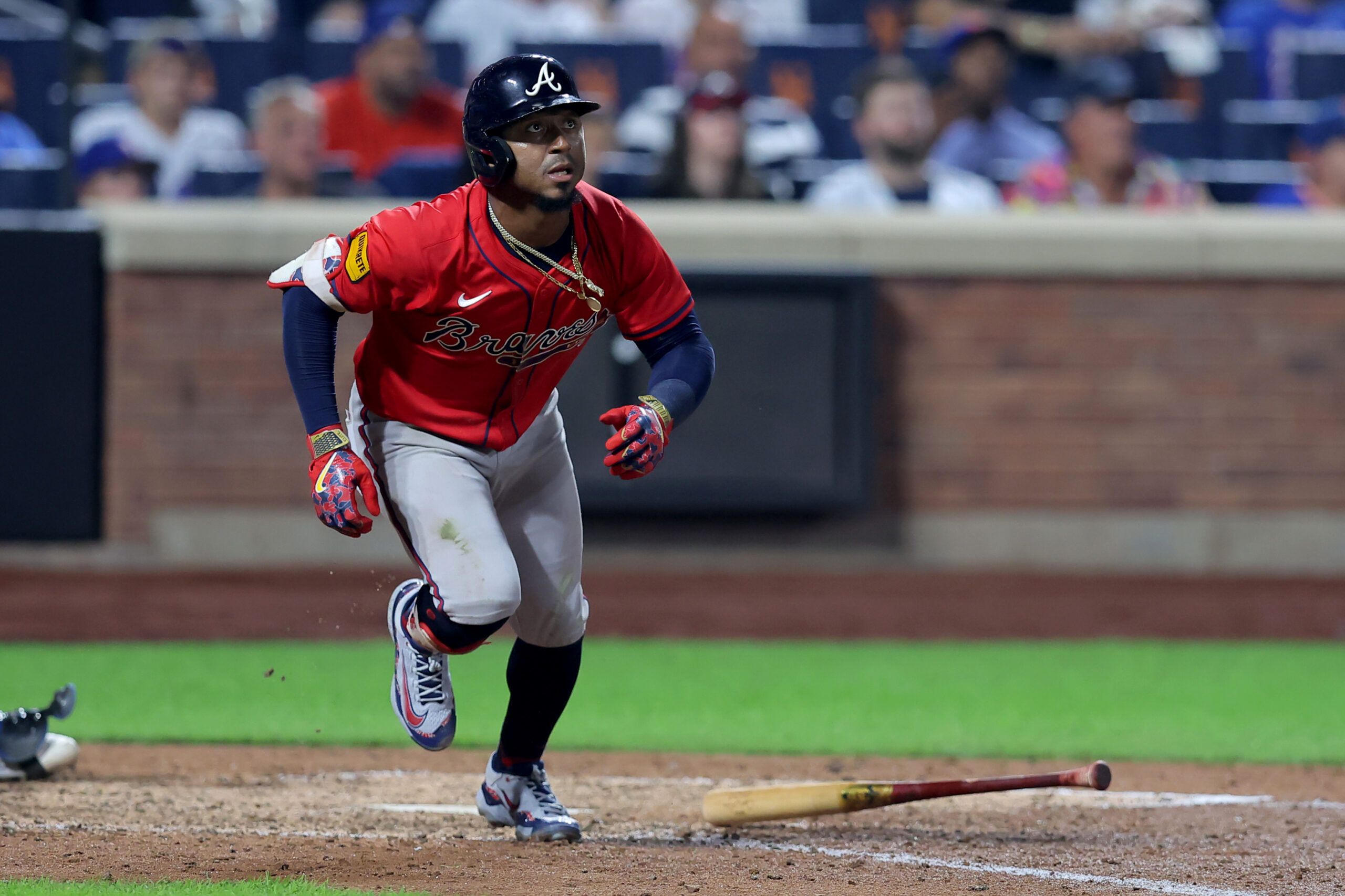 Aug 14, 2025; New York City, New York, USA; Atlanta Braves second baseman Ozzie Albies (1) watches his RBI double against the New York Mets during the eighth inning at Citi Field. Mandatory Credit: Brad Penner-Imagn Images