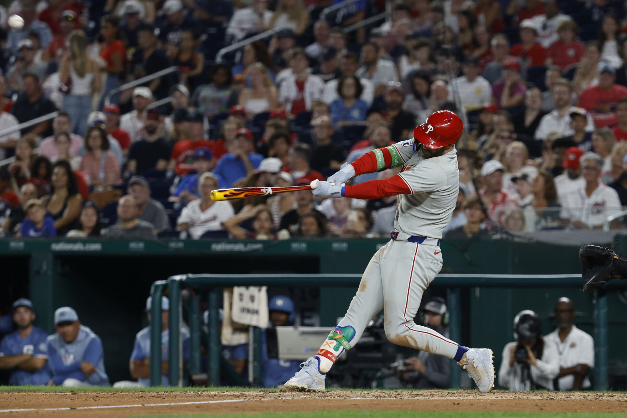 Aug 15, 2025; Washington, District of Columbia, USA; Philadelphia Phillies first baseman Bryce Harper (3) hits a solo home run against the Washington Nationals during the seventh inning at Nationals Park. Mandatory Credit: Geoff Burke-Imagn Images