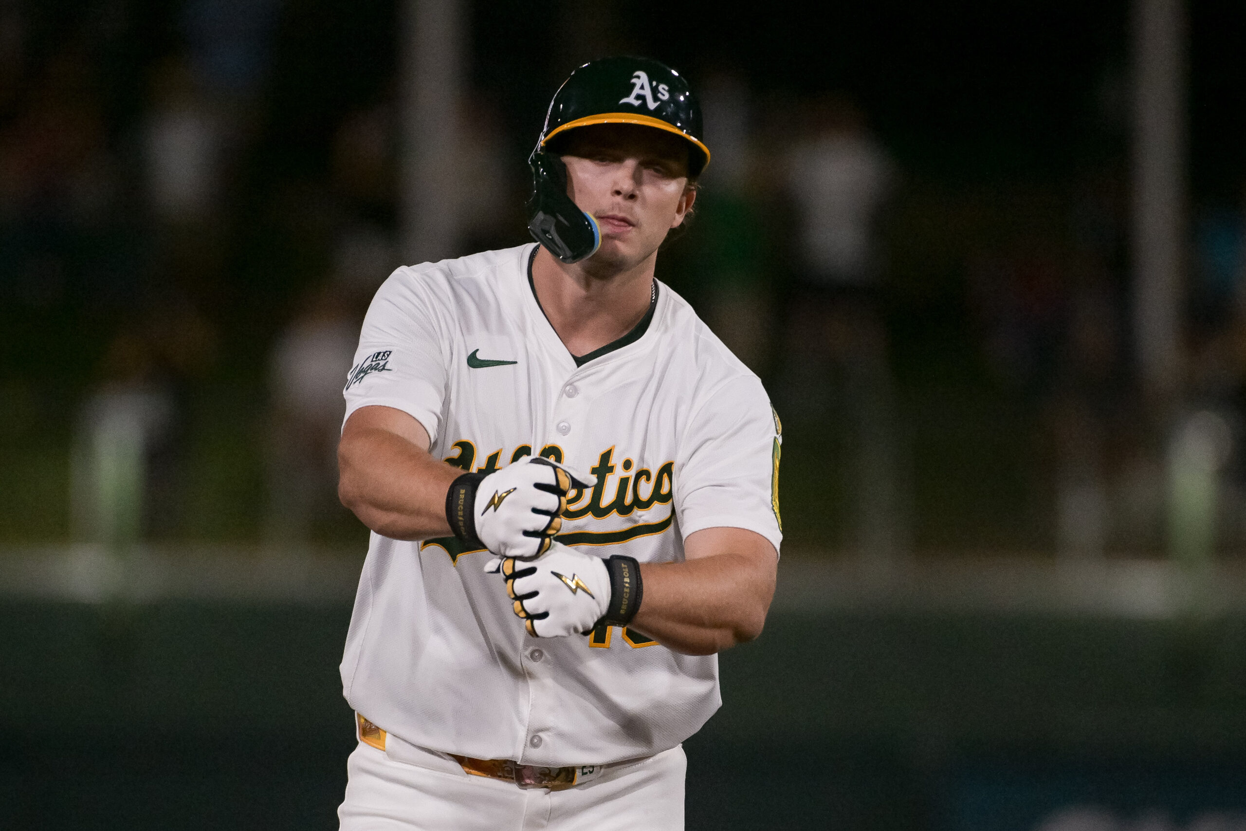 Aug 15, 2025; West Sacramento, California, USA; Athletics first baseman Nick Kurtz (16) motions to his teammates after hitting a home run against the Los Angeles Angels during the eighth inning at Sutter Health Park. Mandatory Credit: Ed Szczepanski-Imagn Images