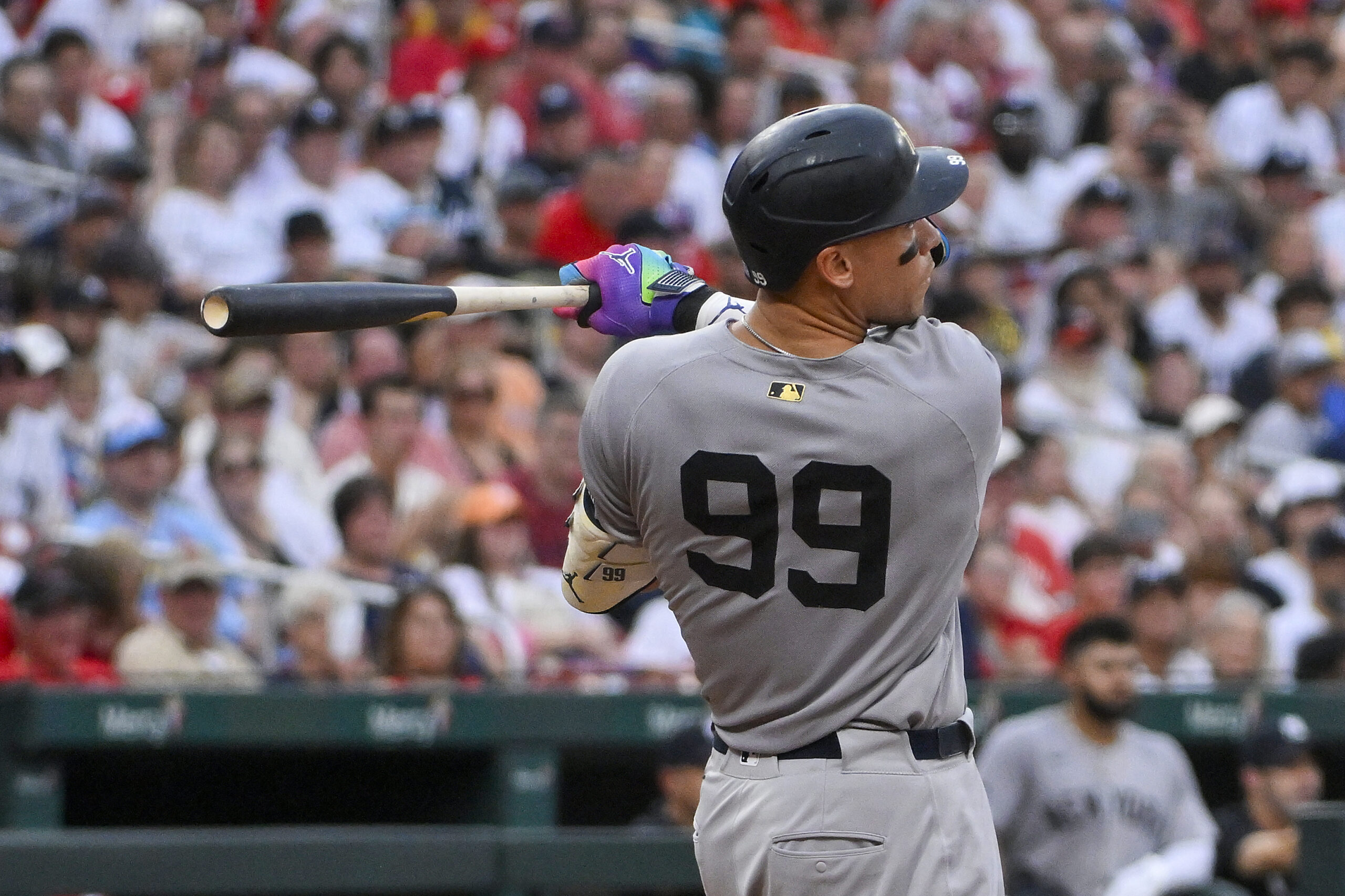 Aug 16, 2025; St. Louis, Missouri, USA;  New York Yankees designated hitter Aaron Judge (99) hits a solo home run against the St. Louis Cardinals during the third inning at Busch Stadium. Mandatory Credit: Jeff Curry-Imagn Images