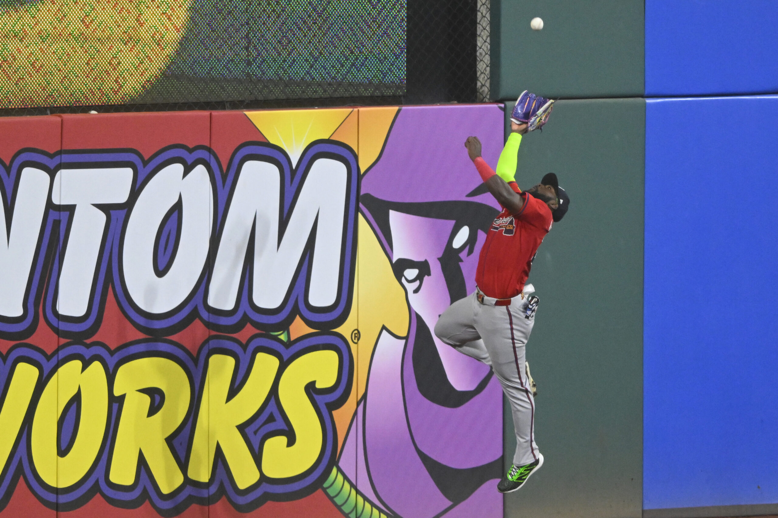 Aug 16, 2025; Cleveland, Ohio, USA; Atlanta Braves center fielder Michael Harris II (23) makes a catch at the wall in the ninth inning against the Cleveland Guardians at Progressive Field. Mandatory Credit: David Richard-Imagn Images