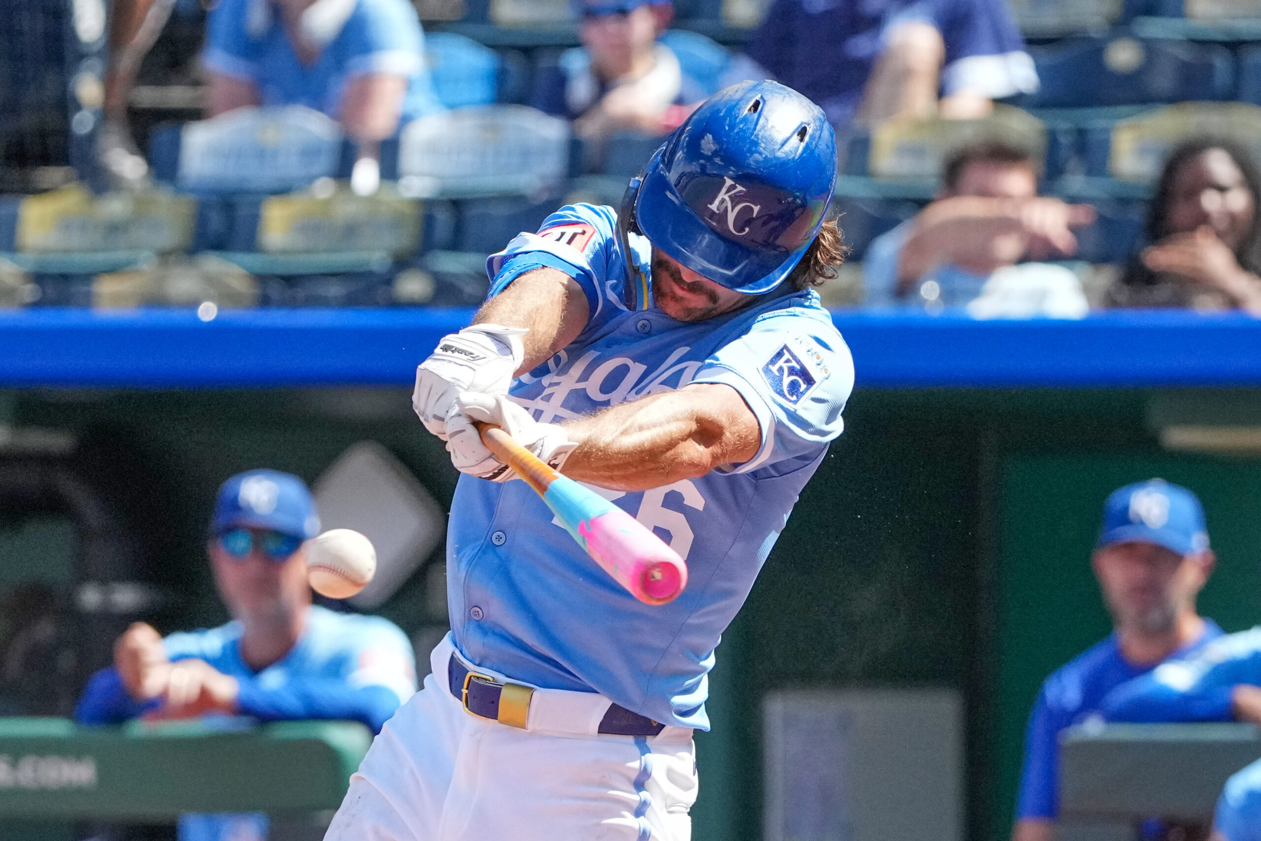 Aug 17, 2025; Kansas City, Missouri, USA; Kansas City Royals left fielder Adam Frazier (26) hits a double against the Chicago White Sox in the seventh inning at Kauffman Stadium. Mandatory Credit: Denny Medley-Imagn Images