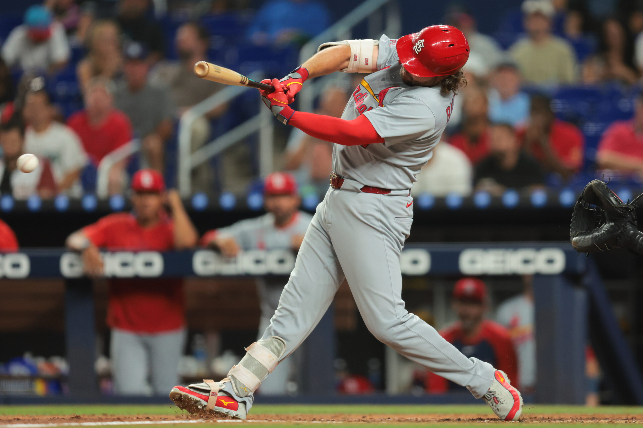 Aug 18, 2025; Miami, Florida, USA; St. Louis Cardinals left fielder Alec Burleson (41) hits an RBI single against the Miami Marlins during the fifth inning at loanDepot Park. Mandatory Credit: Sam Navarro-Imagn Images