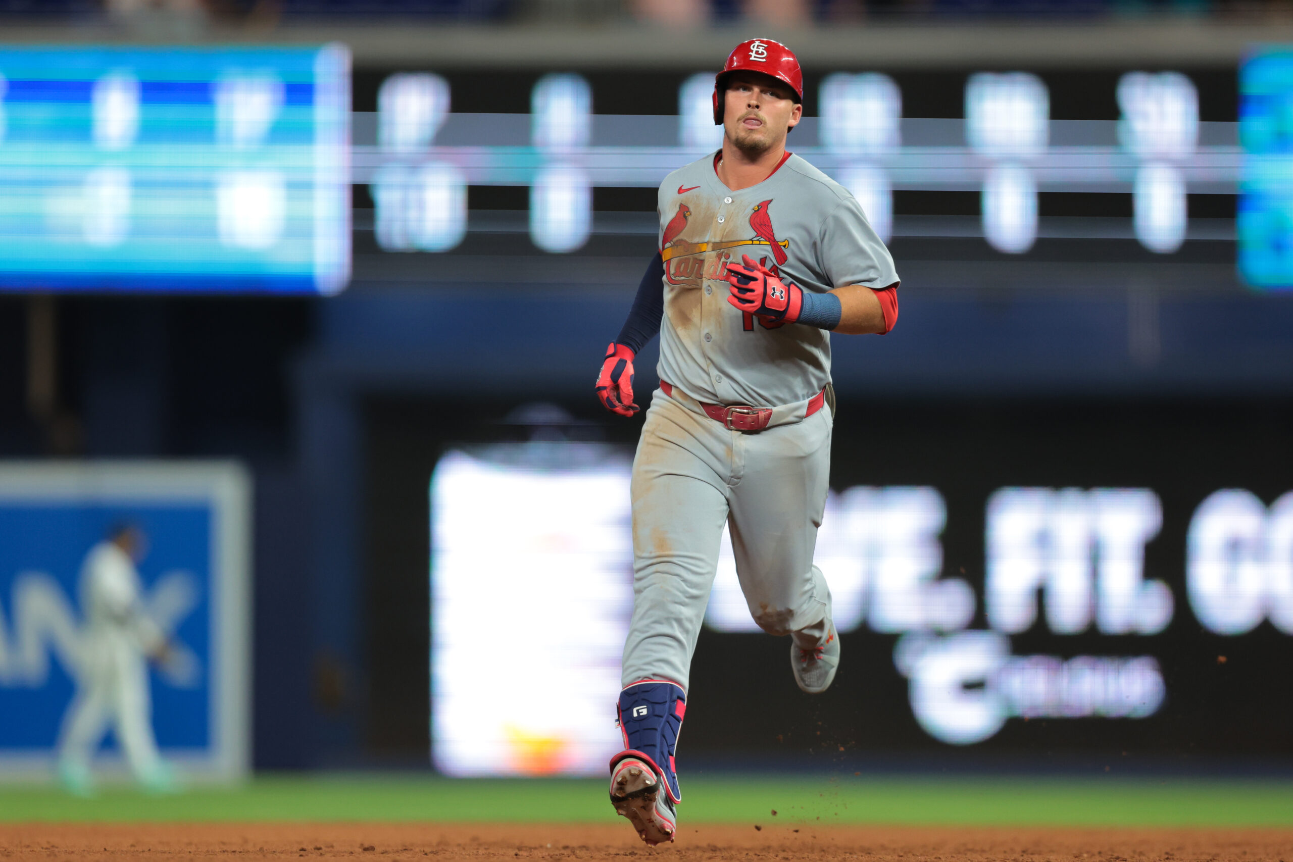 Aug 18, 2025; Miami, Florida, USA; St. Louis Cardinals third baseman Nolan Gorman (16) circles the bases after hitting a two-run home run against the Miami Marlins during the ninth inning at loanDepot Park. Mandatory Credit: Sam Navarro-Imagn Images