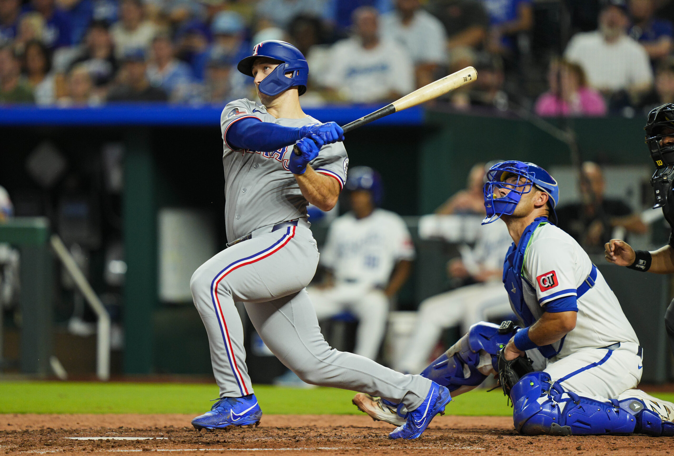 Aug 18, 2025; Kansas City, Missouri, USA; Texas Rangers left fielder Wyatt Langford (36) hits a single during the sixth inning against the Kansas City Royals at Kauffman Stadium. Mandatory Credit: Jay Biggerstaff-Imagn Images