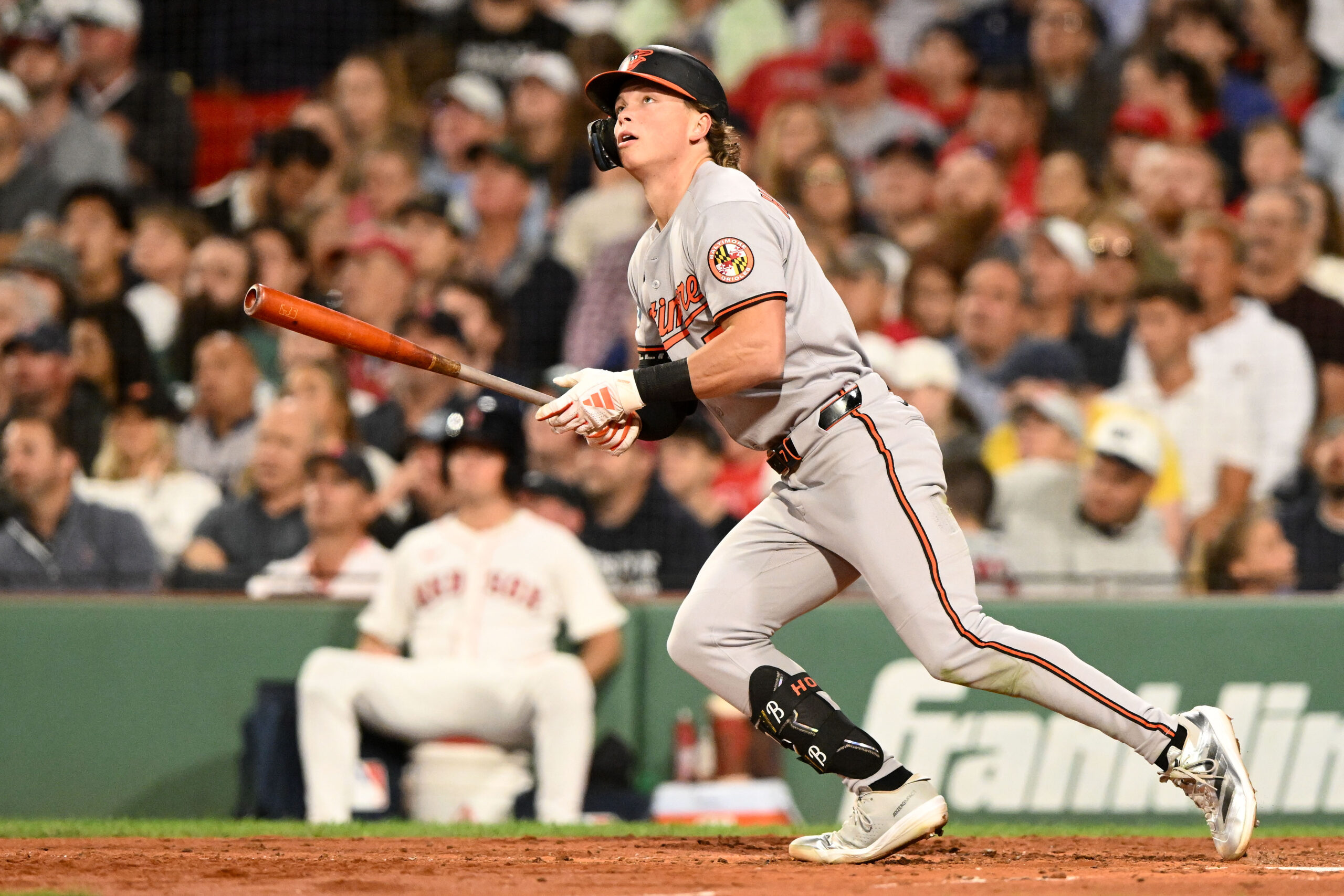 Aug 19, 2025; Boston, Massachusetts, USA; Baltimore Orioles second baseman Jackson Holliday (7) hits a double against the Boston Red Sox during the fifth inning at Fenway Park. Mandatory Credit: Brian Fluharty-Imagn Images