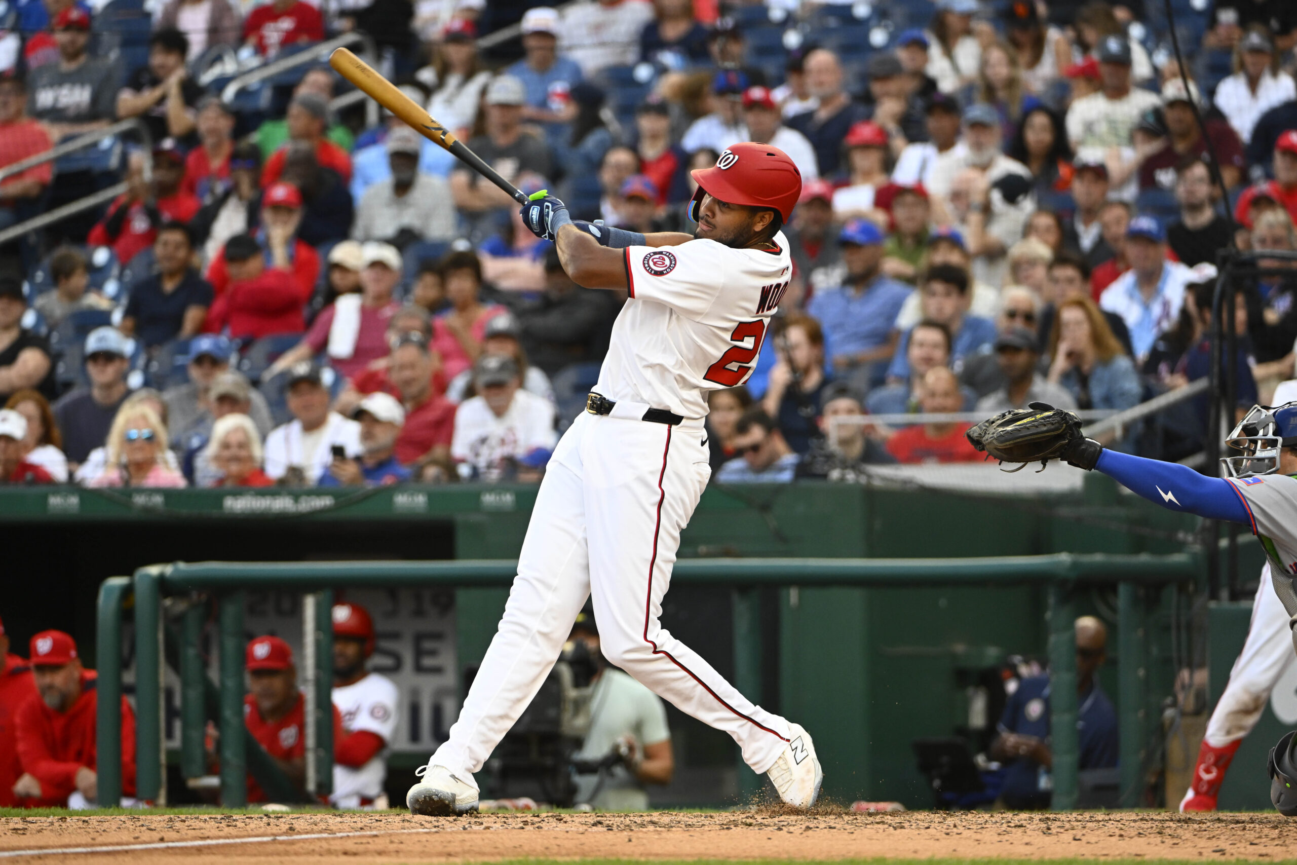 Aug 21, 2025; Washington, District of Columbia, USA; Washington Nationals designated hits a three run home run against the New York Mets during the eighth inning James Wood (29) hit at Nationals Park. Mandatory Credit: Brad Mills-Imagn Images