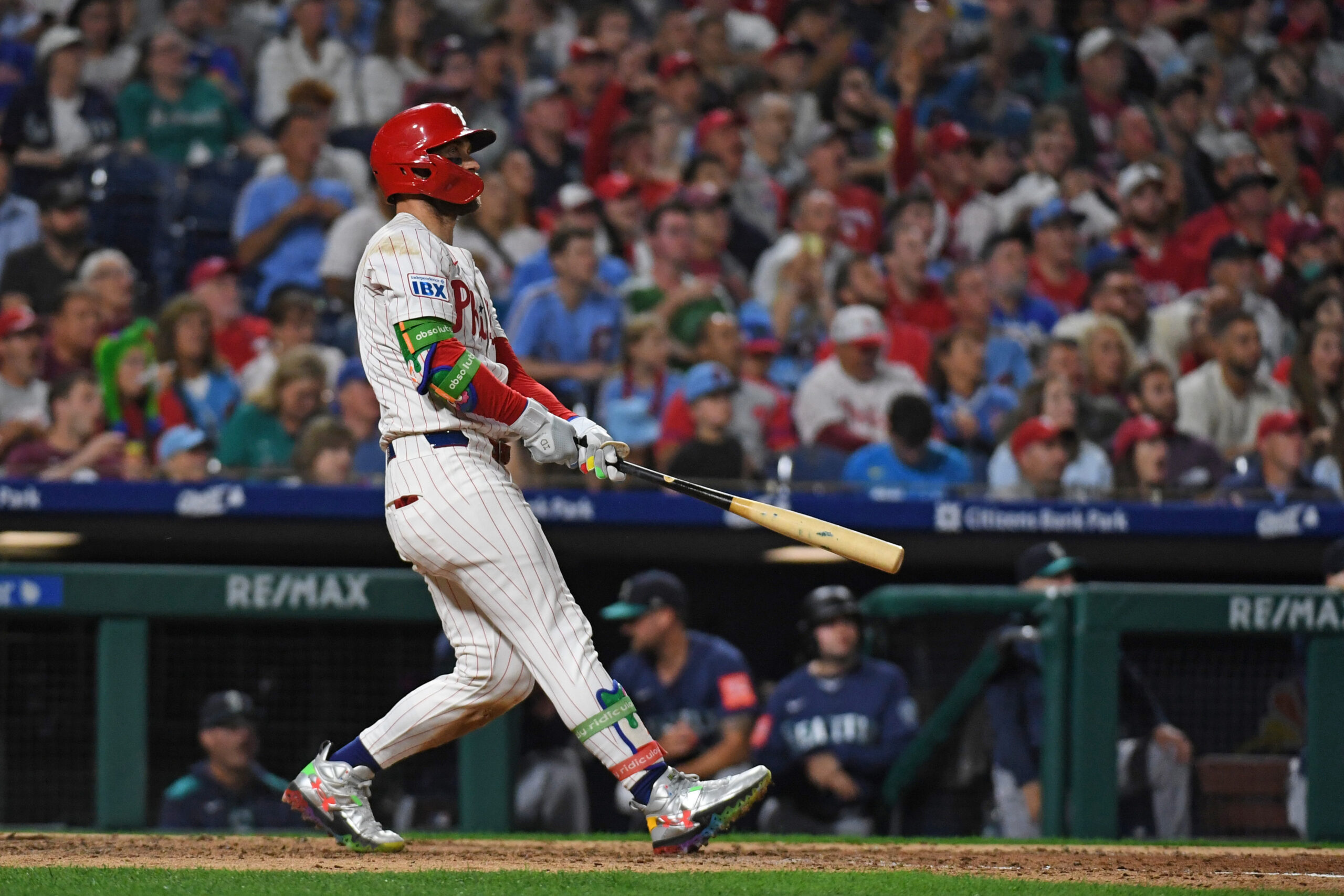 Aug 18, 2025; Philadelphia, Pennsylvania, USA; Philadelphia Phillies first base Bryce Harper (3) watches his home run against the Seattle Mariners at Citizens Bank Park. Mandatory Credit: Eric Hartline-Imagn Images