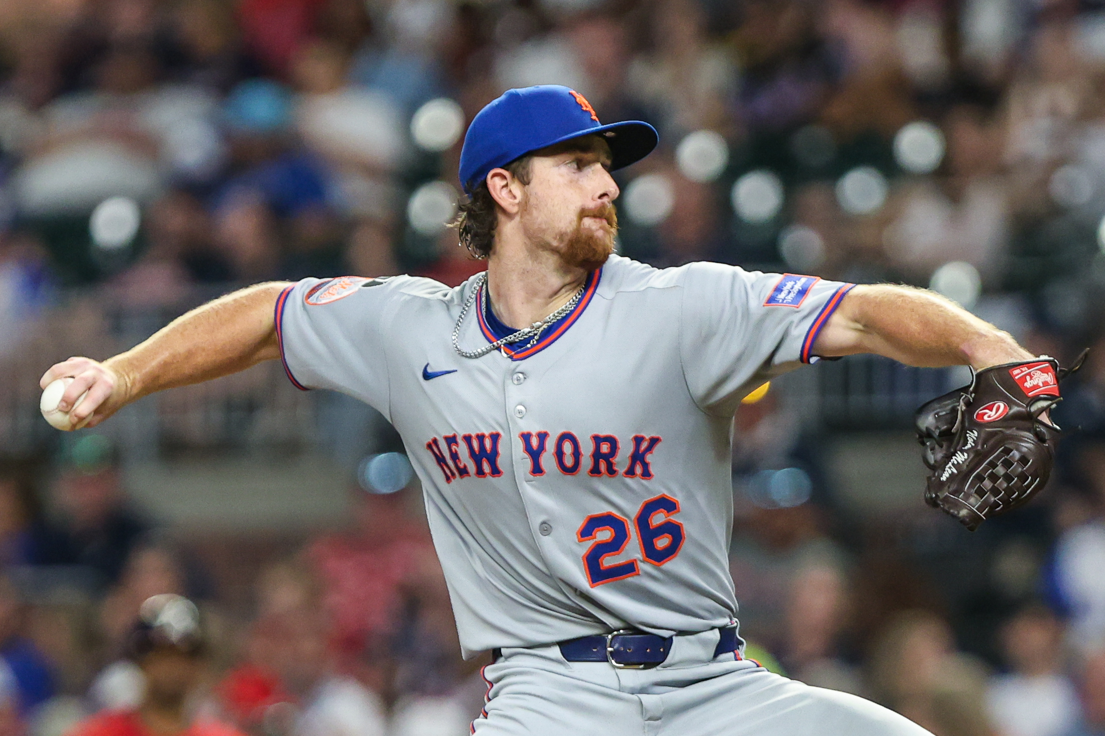 Aug 22, 2025; Cumberland, Georgia, USA; New York Mets pitcher Nolan McLean (26) pitches the ball against the Atlanta Braves during the sixth inning at Truist Park. Mandatory Credit: Jordan Godfree-Imagn Images
