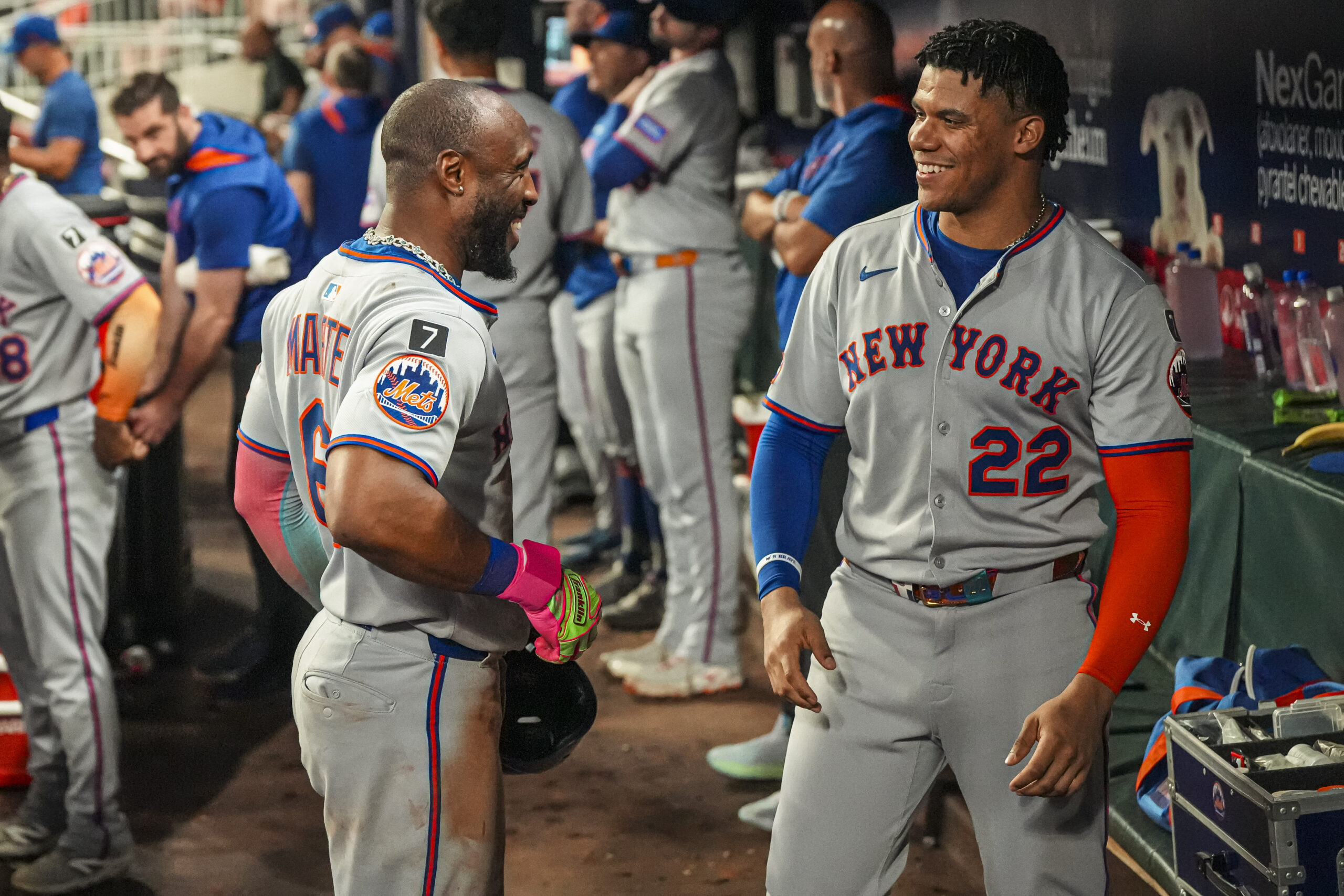 Aug 23, 2025; Cumberland, Georgia, USA; New York Mets left fielder Starling Marte reacts with right fielder Juan Soto (22) after hitting a home run against the Atlanta Braves during the seventh inning at Truist Park. Mandatory Credit: Dale Zanine-Imagn Images