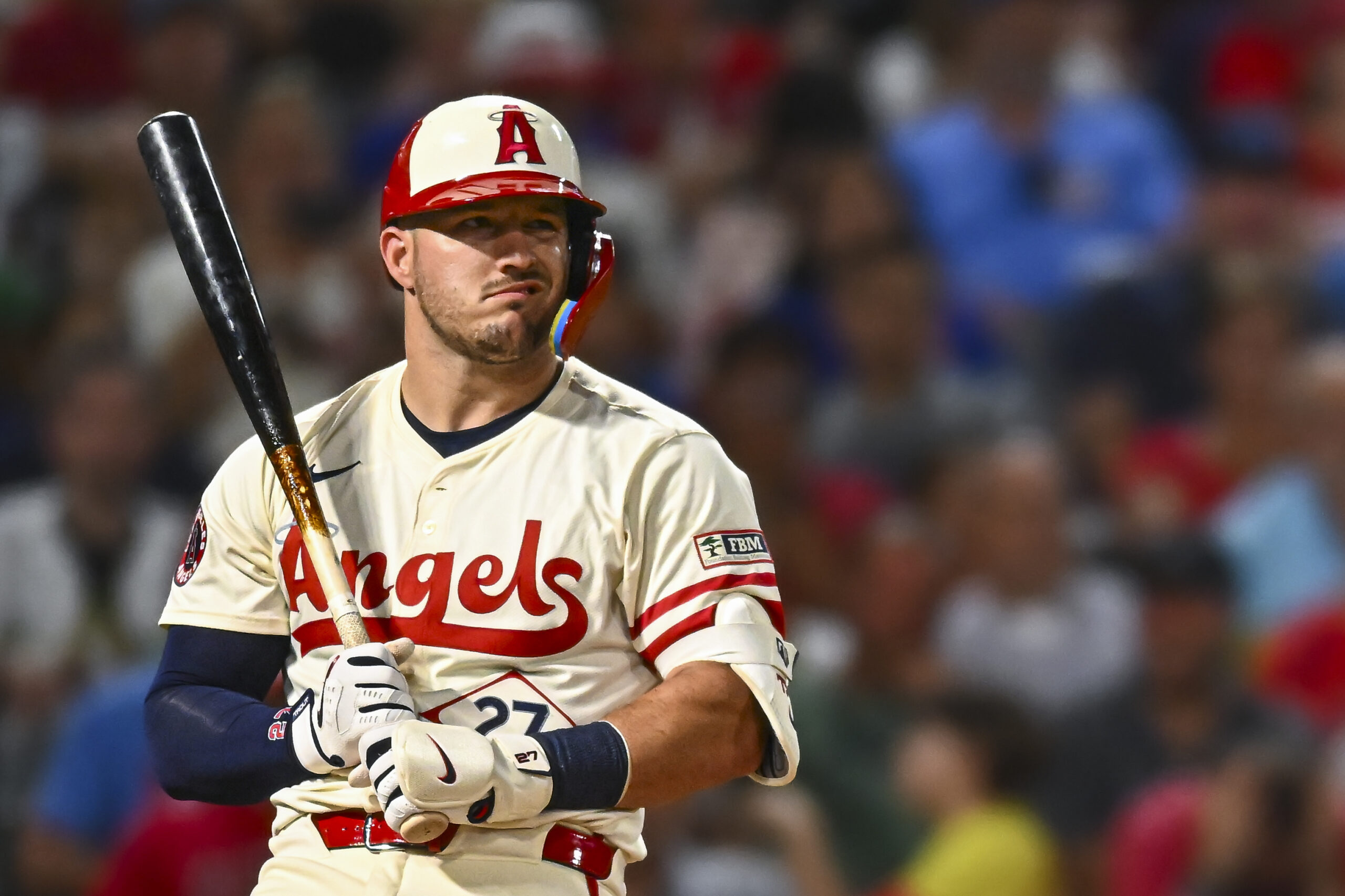 Aug 23, 2025; Anaheim, California, USA; Los Angeles Angels designated hitter Mike Trout (27) reacts after striking out against the Chicago Cubs during the sixth inning at Angel Stadium. Mandatory Credit: Jonathan Hui-Imagn Images