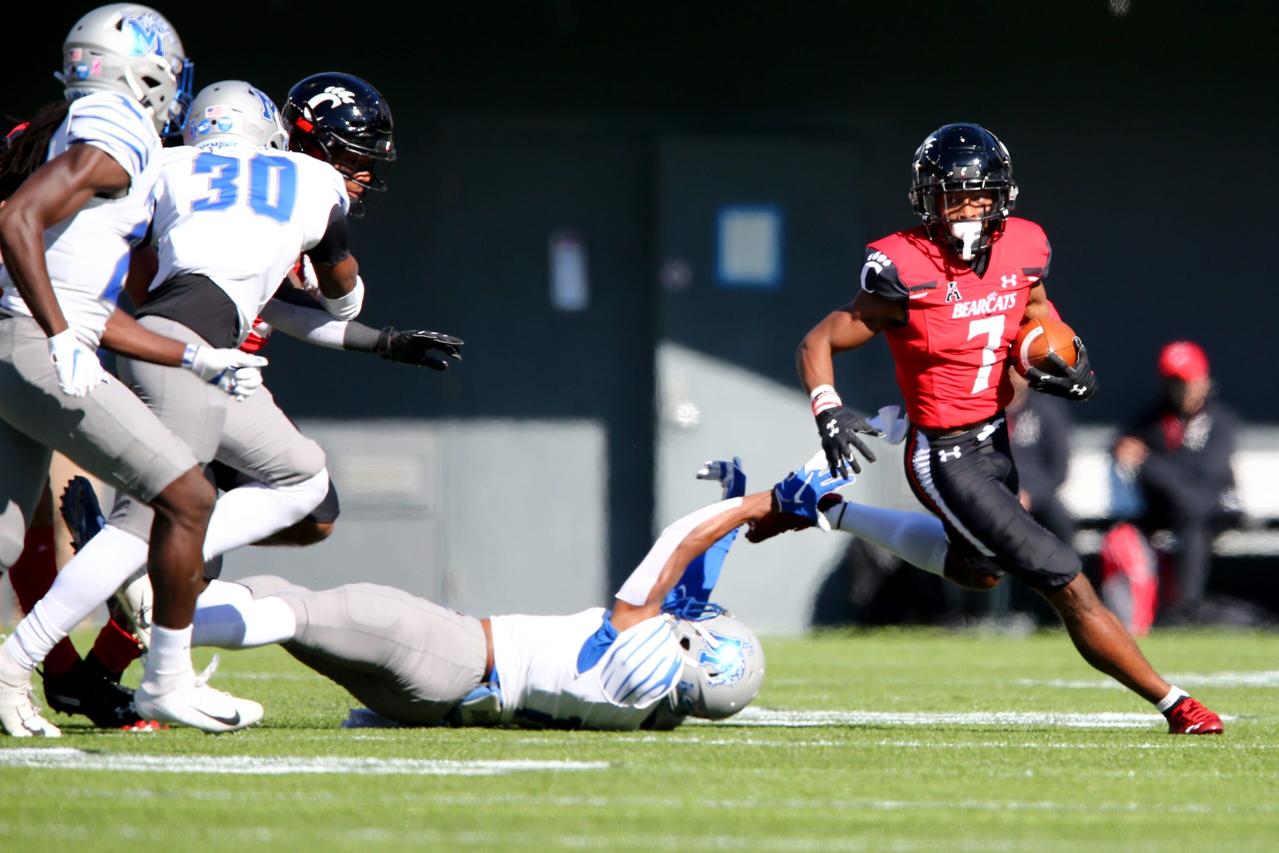 Cincinnati Bearcats wide receiver Tre Tucker (7) runs downfield after catching a pass during the first quarter of a college football game against the Memphis Tigers, Saturday, Oct. 31, 2020, at Nippert Stadium in Cincinnati. The Cincinnati Bearcats lead 21-10.

Memphis Tigers At Cincinnati Bearcats Oct 31